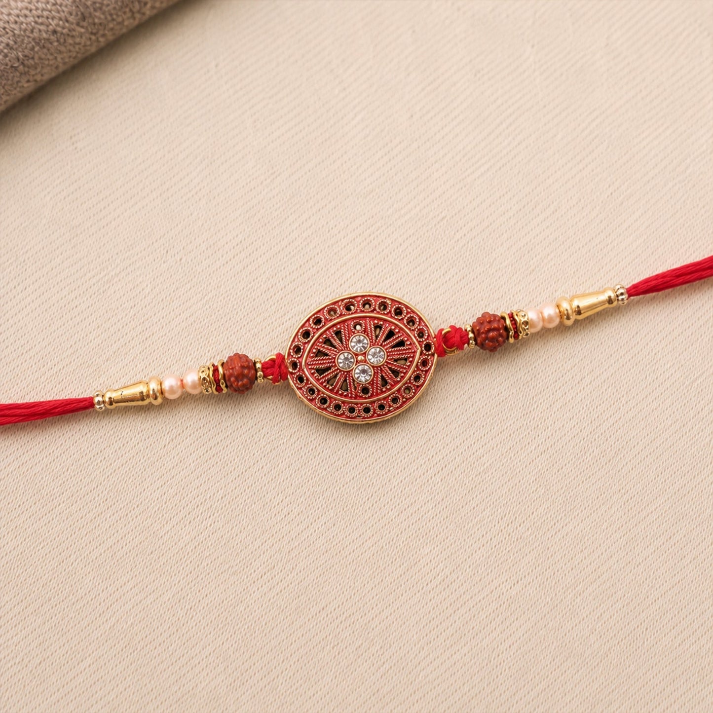 Top view of colorful round red chakra Rakhi for Raksha Bandhan