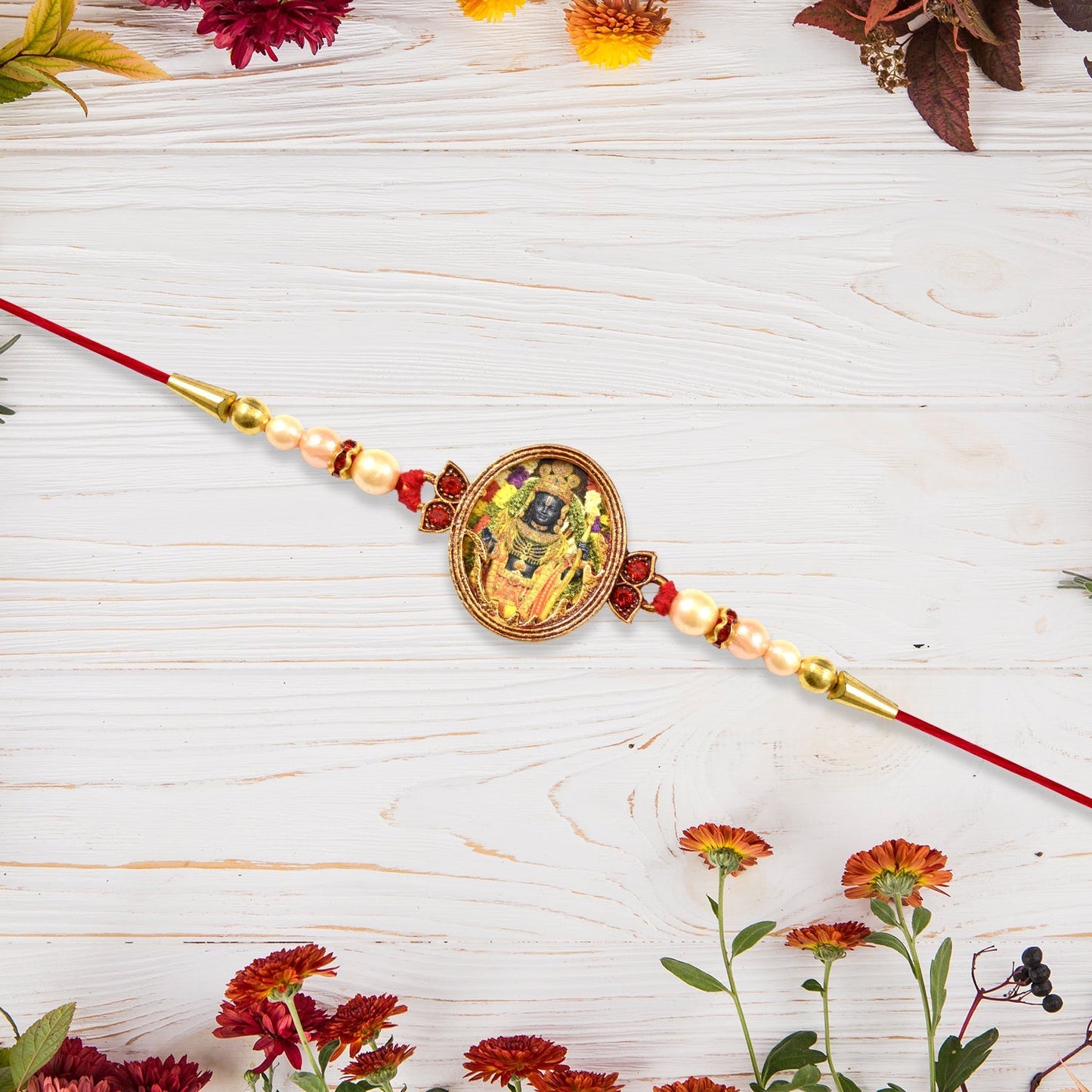 Traditional Maharashtrian inspired rakhi with god motif thread accessory