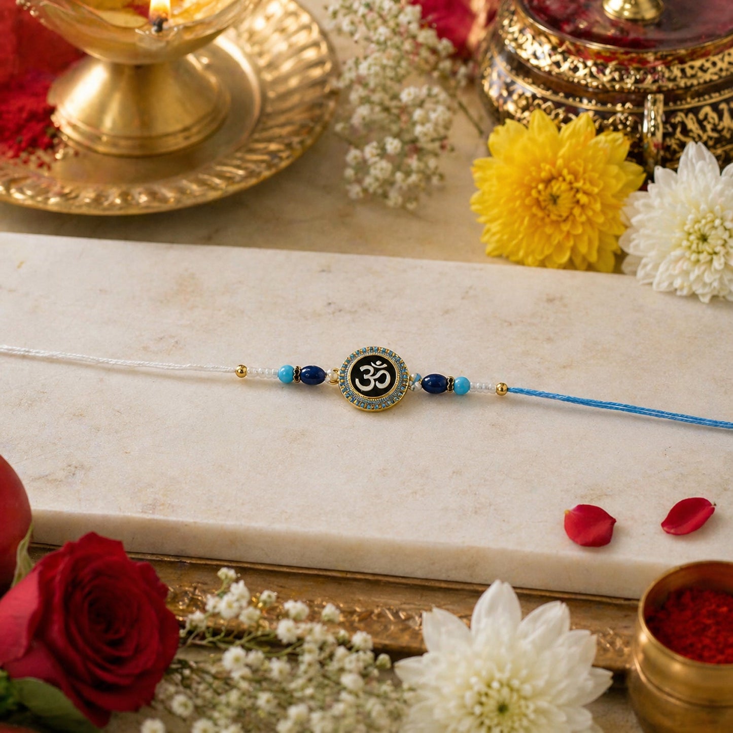 Festive Om symbol Rakhi with beads for Raksha Bandhan