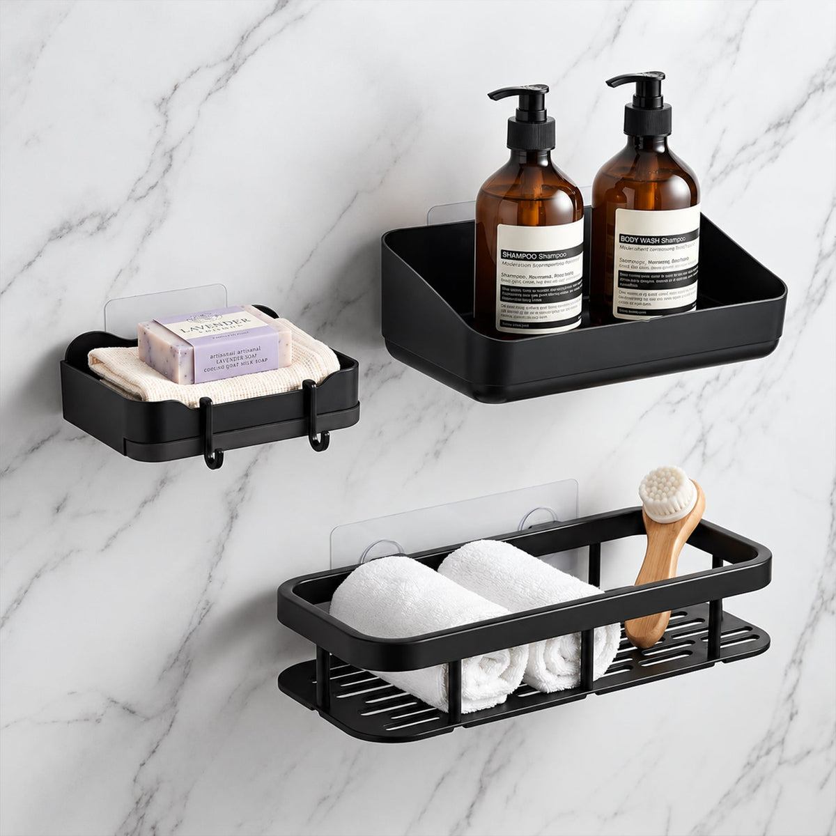 A black corner caddy, rectangular shelf, and soap dish are mounted on a white marble wall, holding towels and bottles.