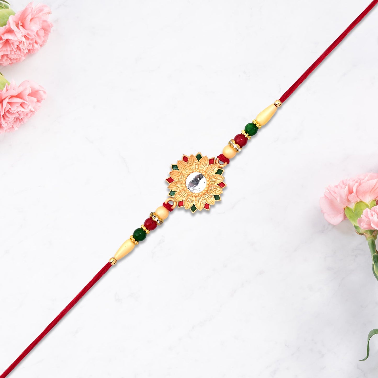 Elegant floral Rakhi featuring a mirror for a heartfelt gift