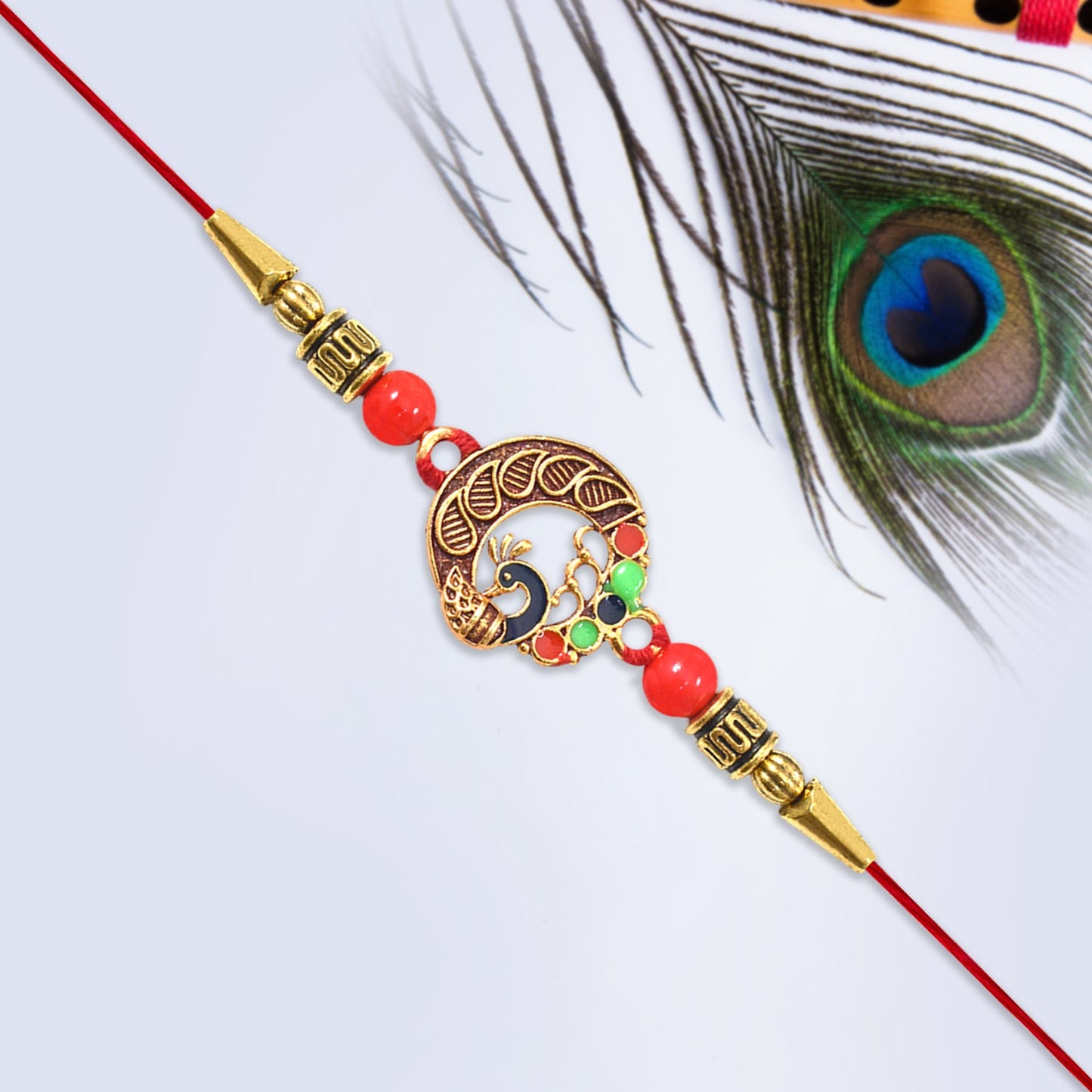 Peacock motif rakhi displayed on wooden surface showing traditional styling