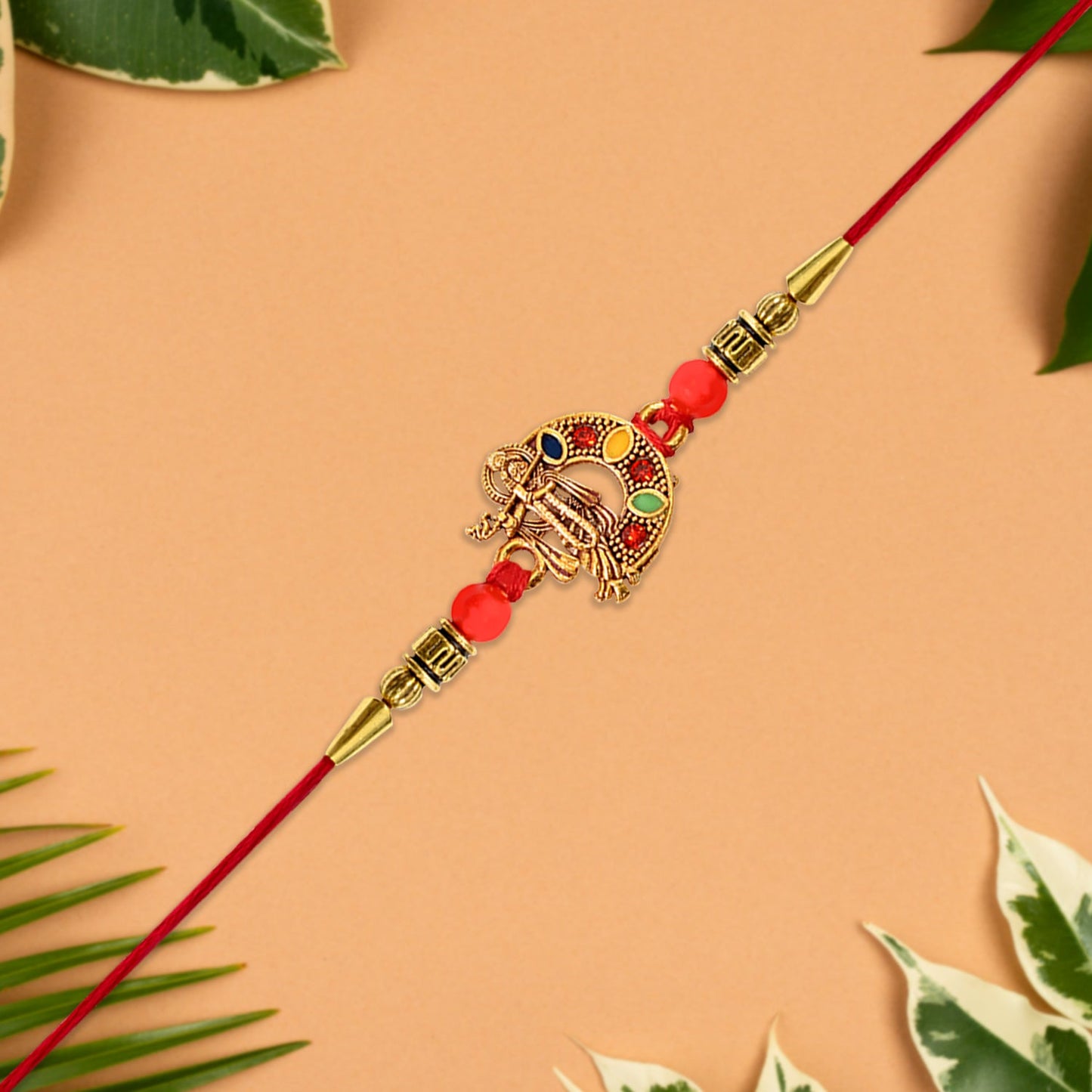 Elegant Lord Krishna Rakhi displaying a divine motif, ideal for Raksha Bandhan.