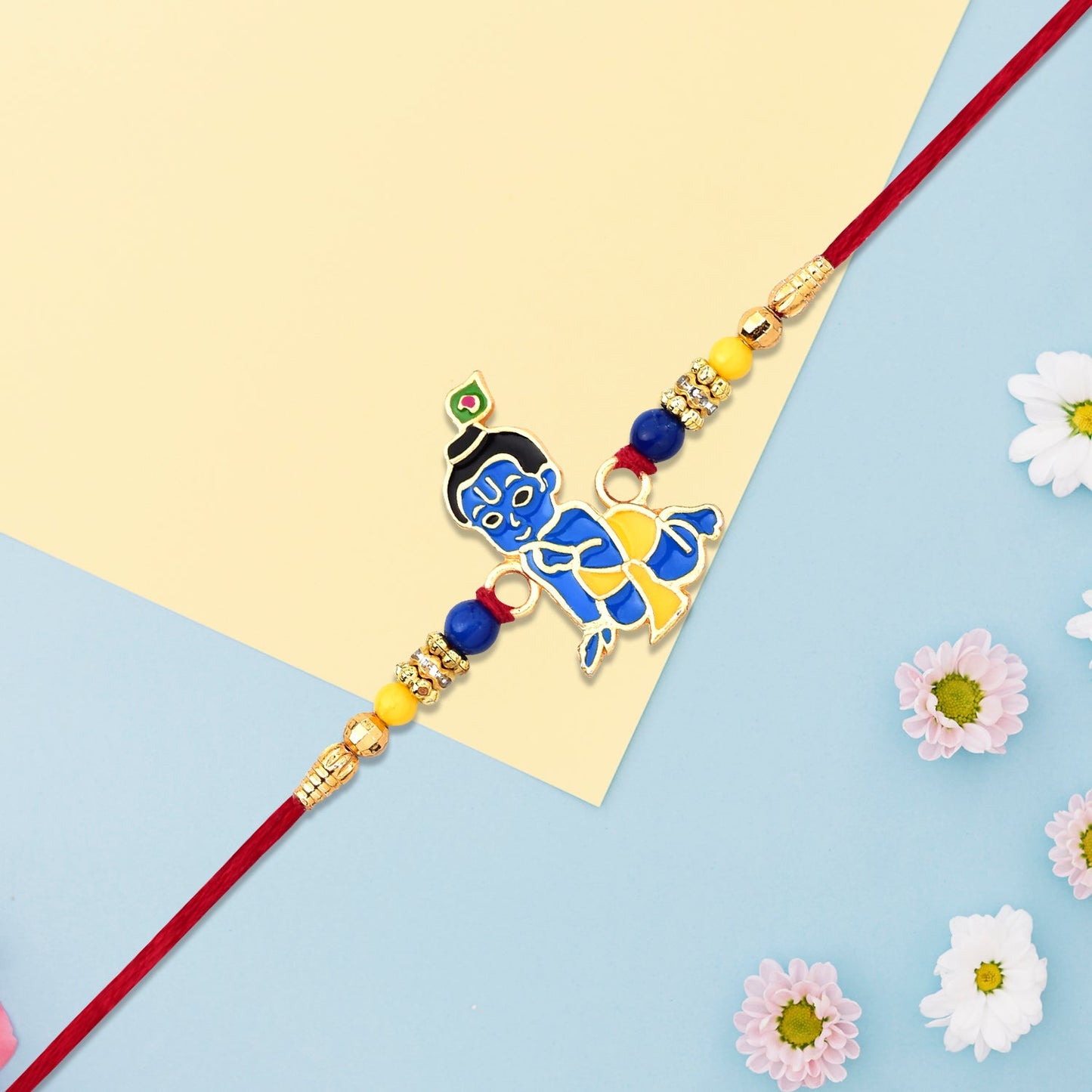 Close-up of Bal Krishna Kids Rakhi with intricate traditional design for children