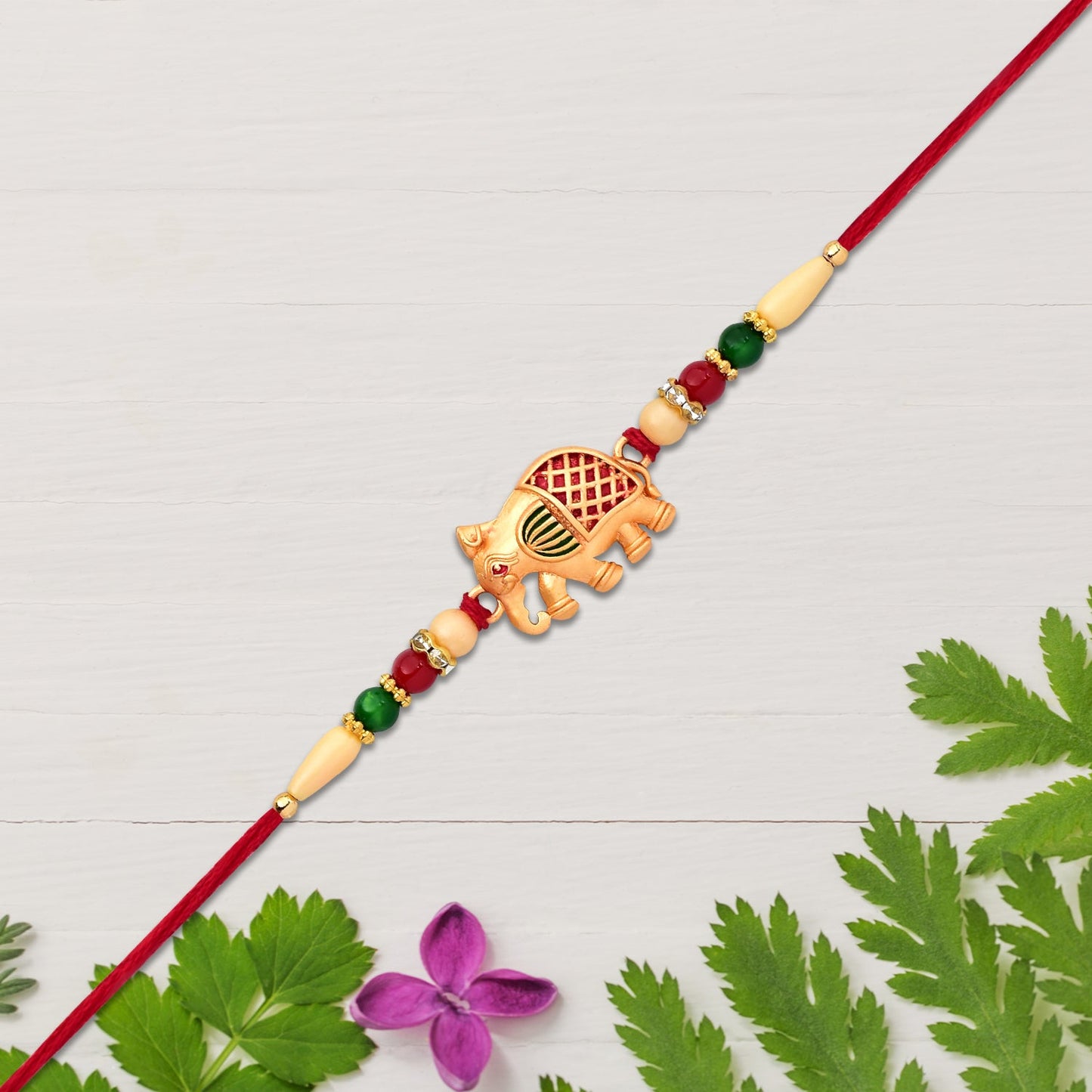 Elephant Rakhi in festive gift box, ideal for brothers.