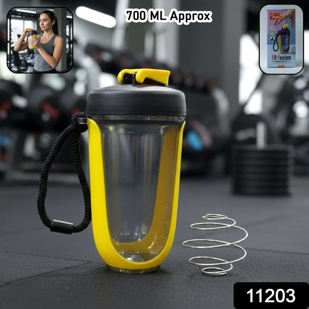A yellow and black shaker bottle with a metal whisk sits on a gym floor, with text indicating 700ml capacity.
