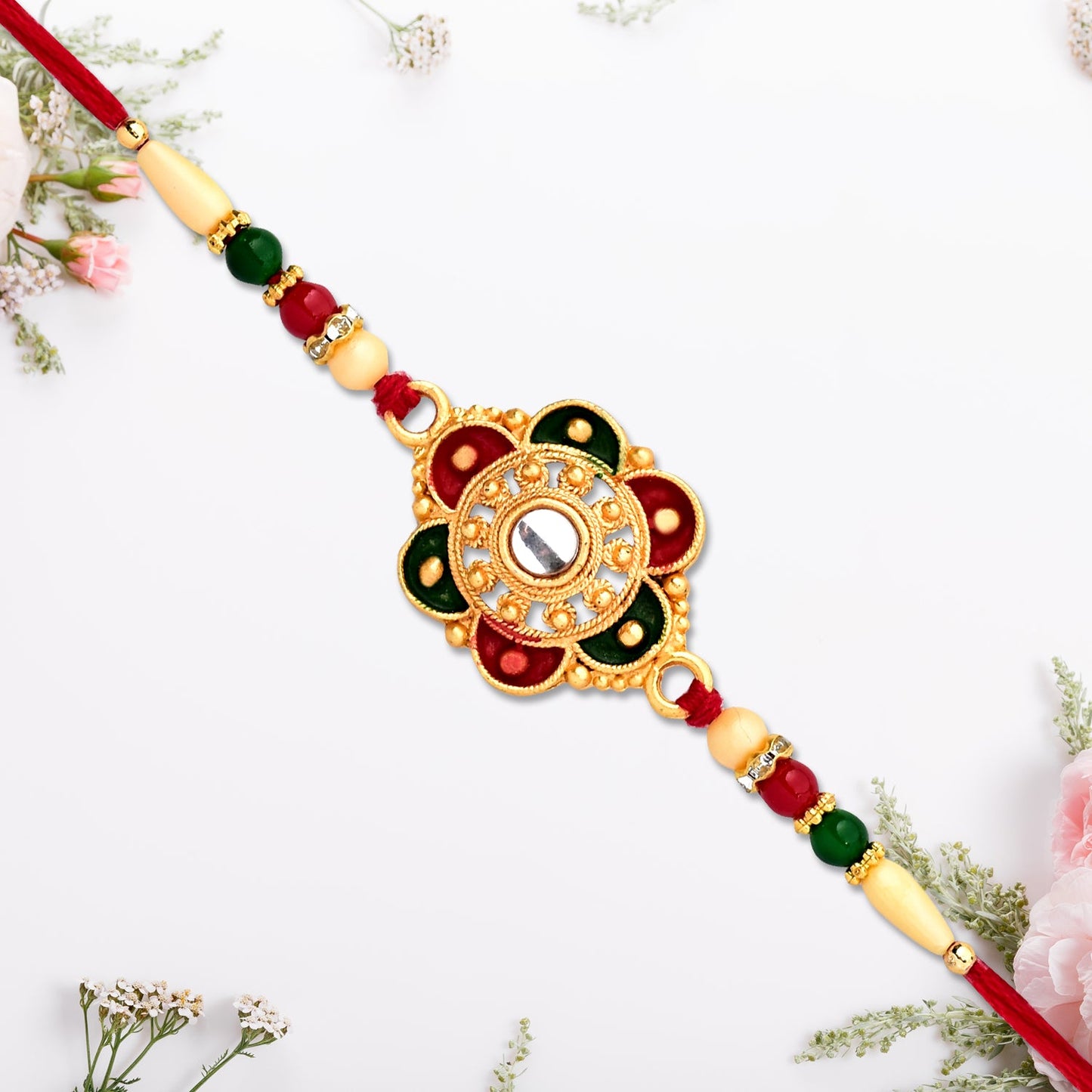 Beautiful traditional Rakhi with floral pattern and beads for Raksha Bandhan