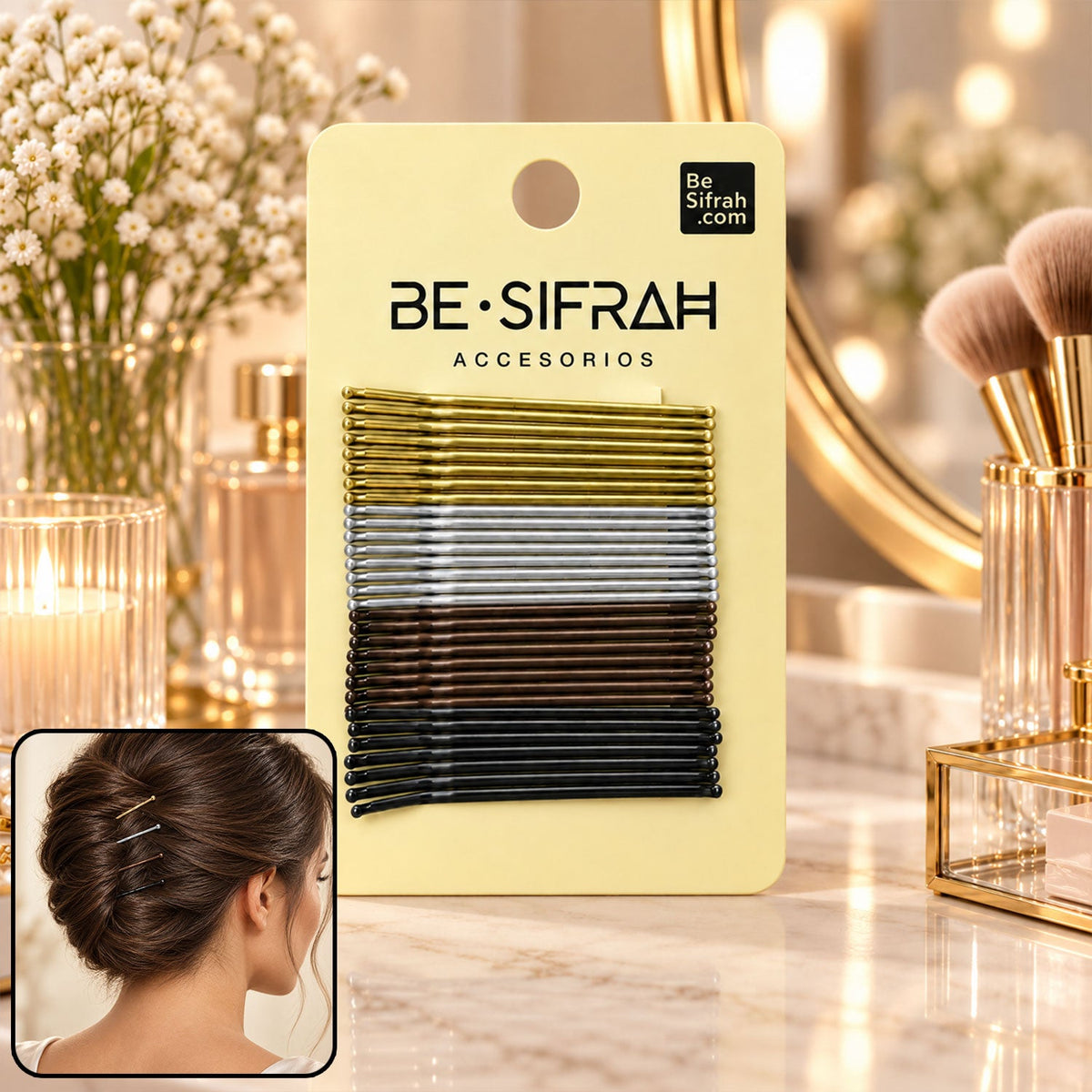 A yellow card holds gold, silver, brown, and black bobby pins, with a woman's styled hair bun in the corner.