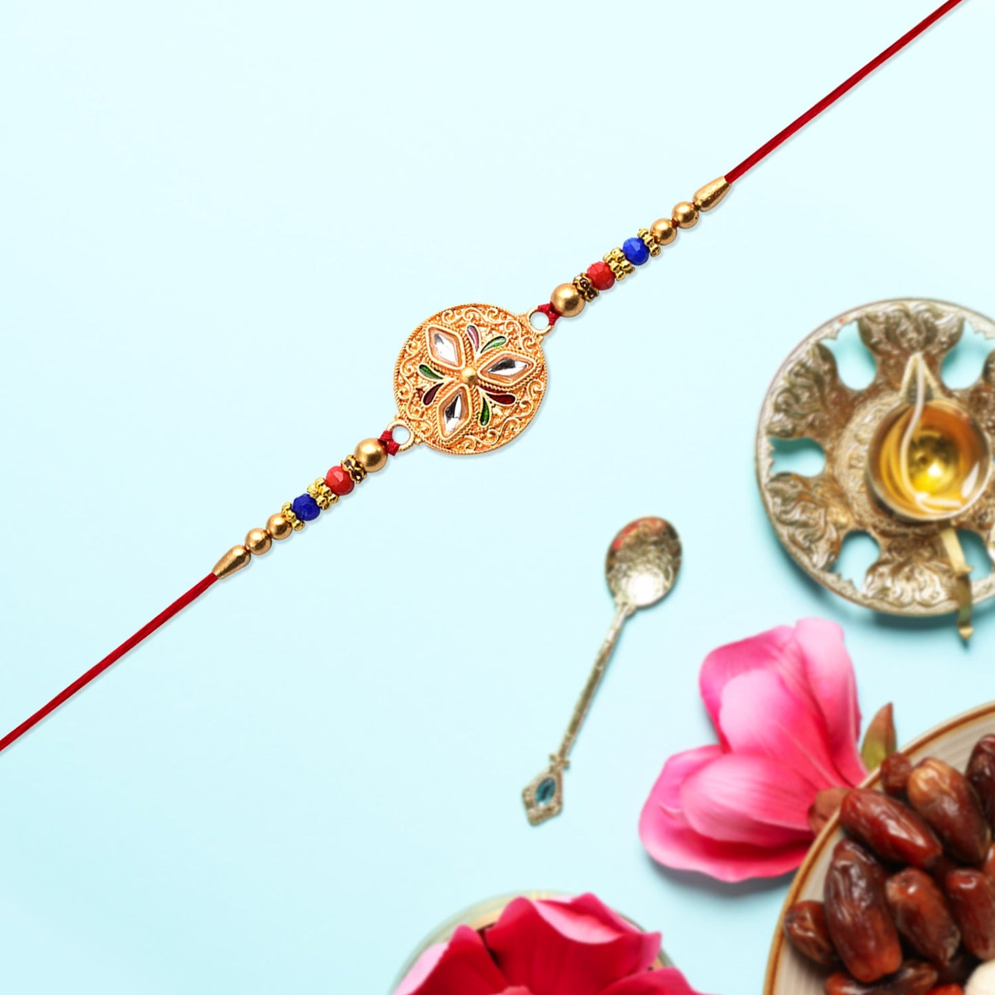 Meenakari floral Rakhi featuring colorful beads and intricate gold detailing