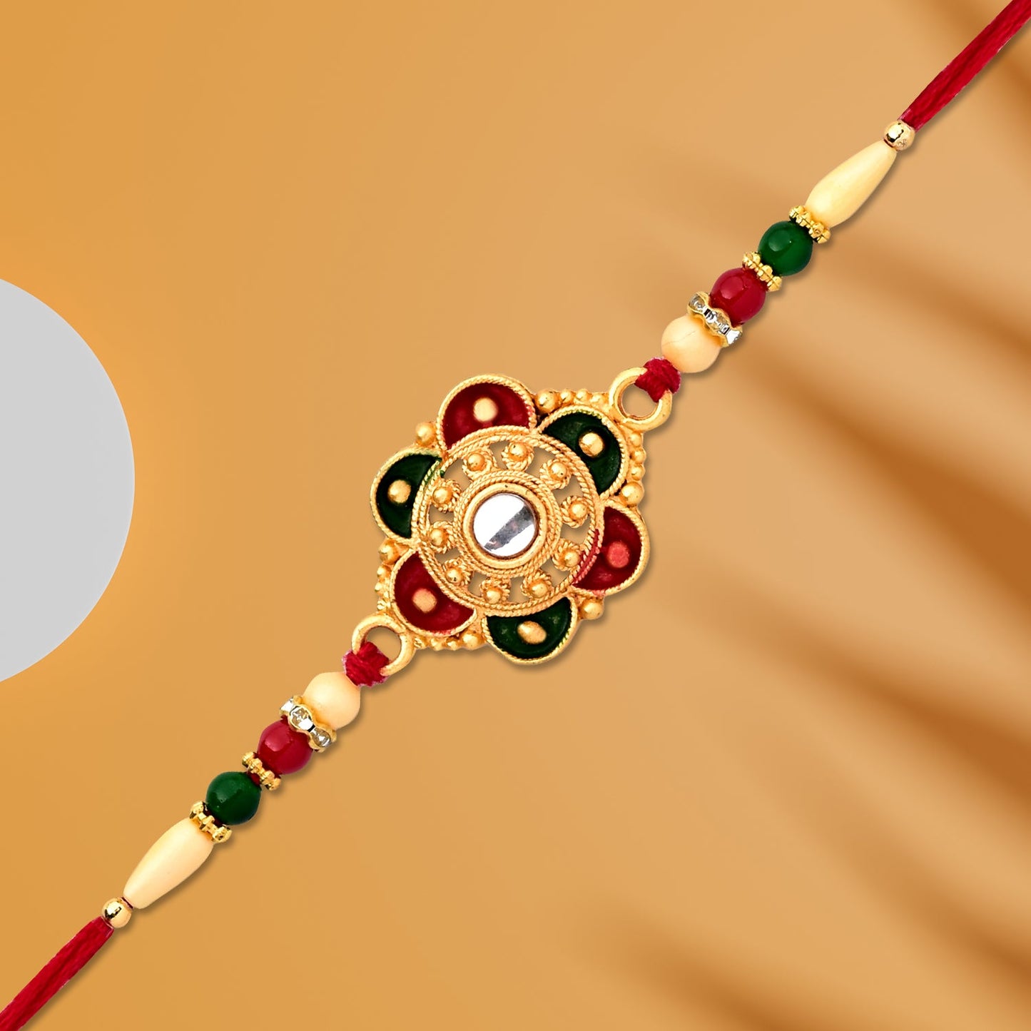 Close-up of floral bead details on traditional Indian Rakhi