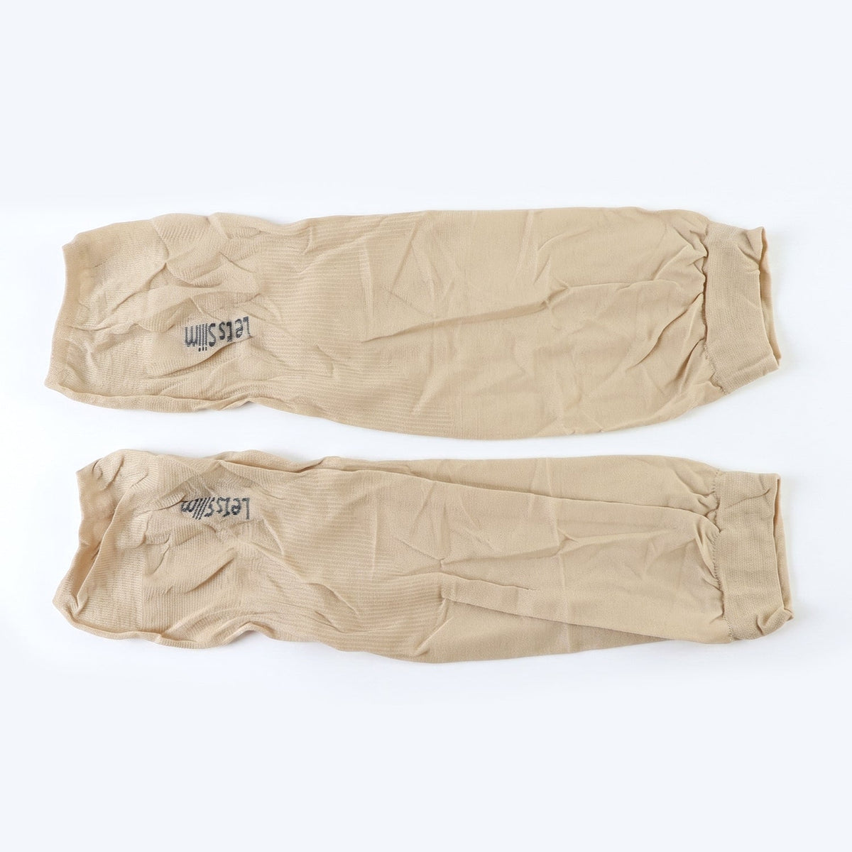 Two beige arm sleeves with "Let's Slim" logo, laid flat on a white background