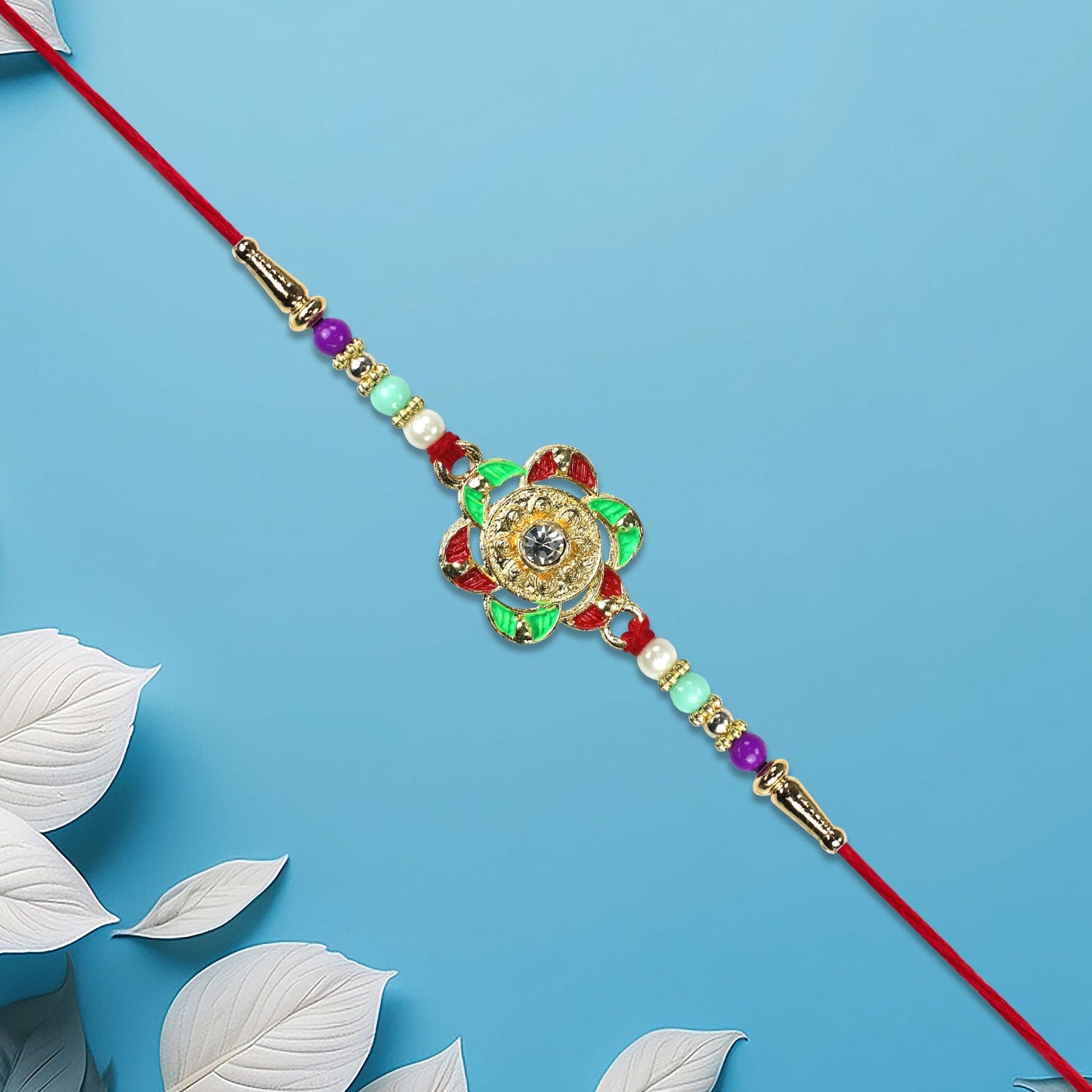 Traditional gold floral Rakhi, ideal for brothers of all ages