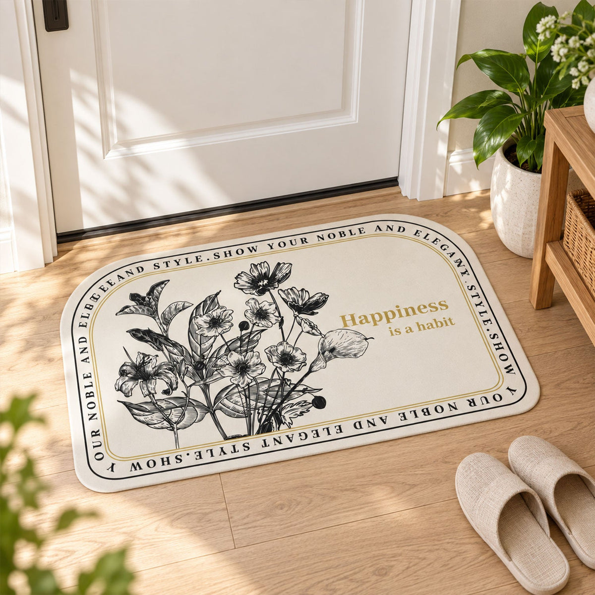 A half-round white mat with black floral print and a golden quote positioned in front of a white door with slippers nearby.
