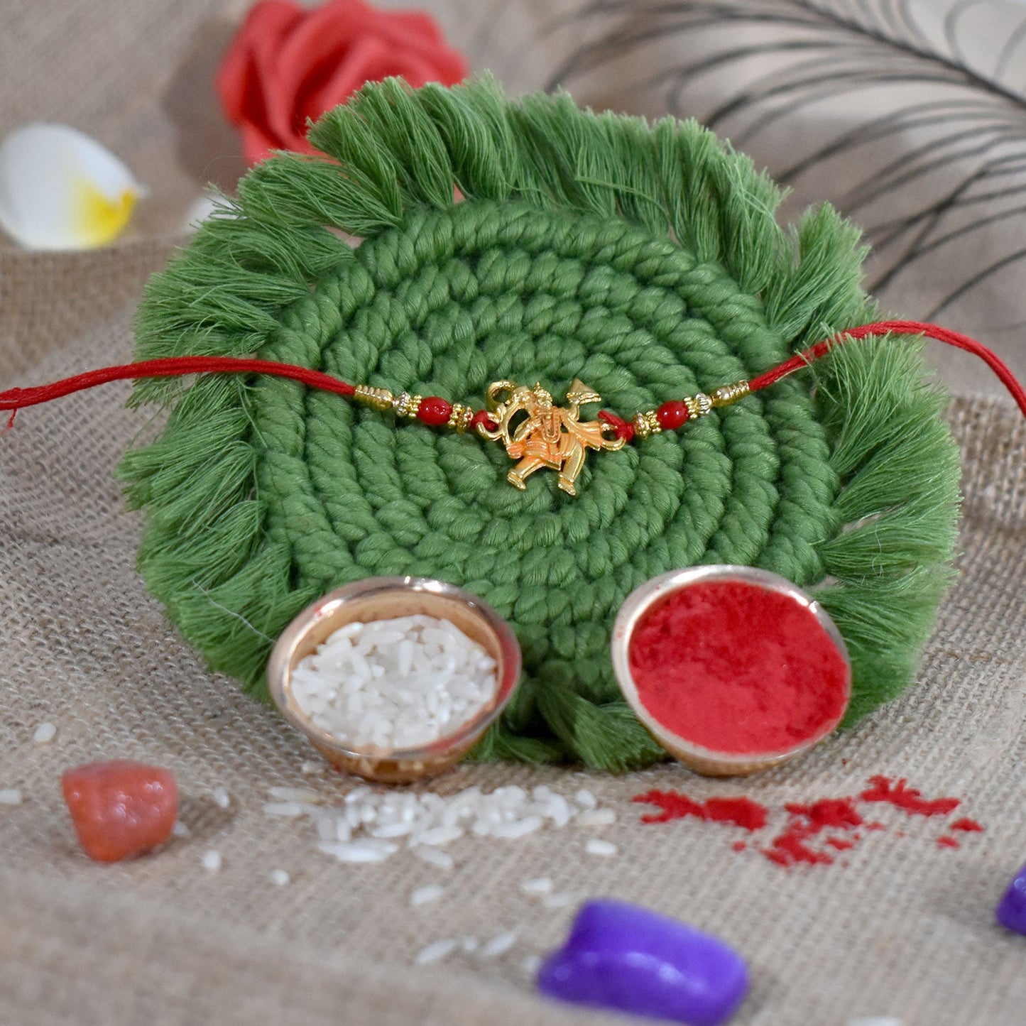 Detail of the Hanumaan ji Rakhi centerpiece and comfortable thread.