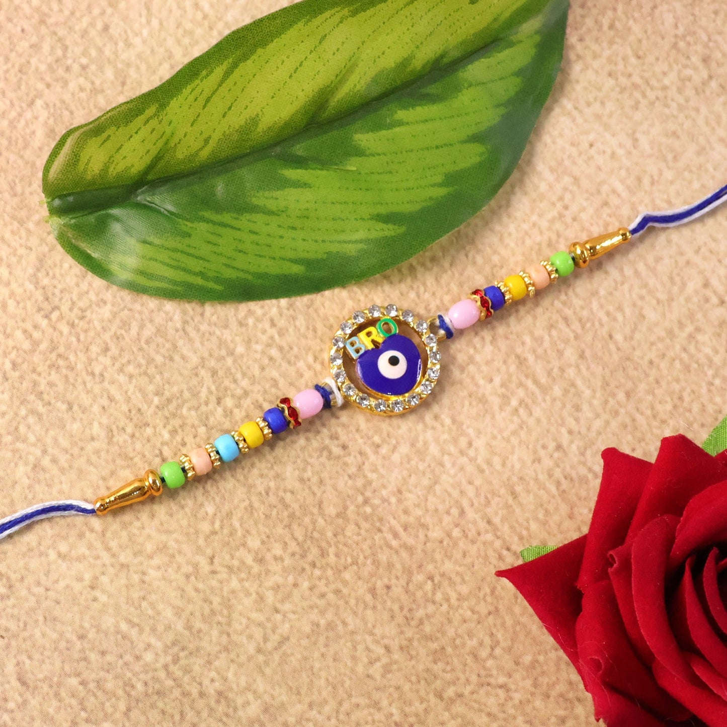 Soft thread and vibrant beads of Evil Eye BRO Rakhi for brother