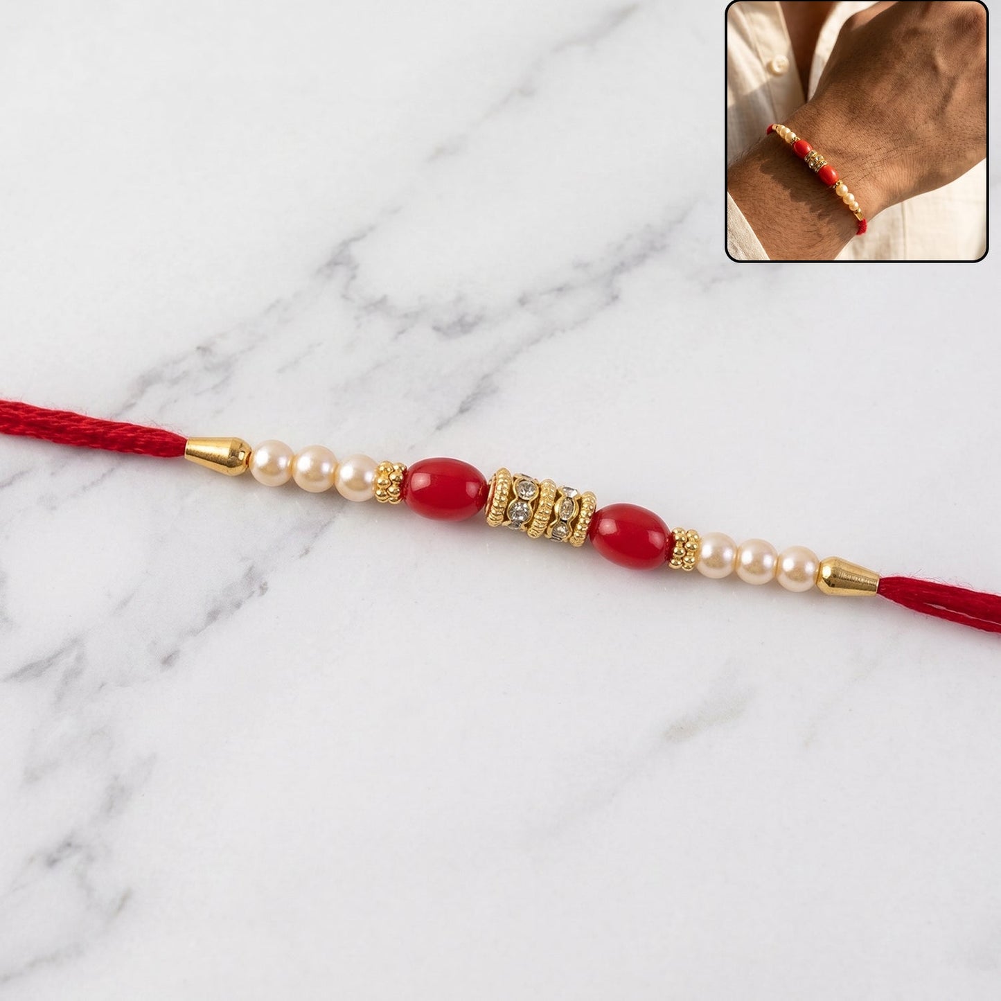 Elegant red moti pearl line rakhi with gold spacer beads for Raksha Bandhan