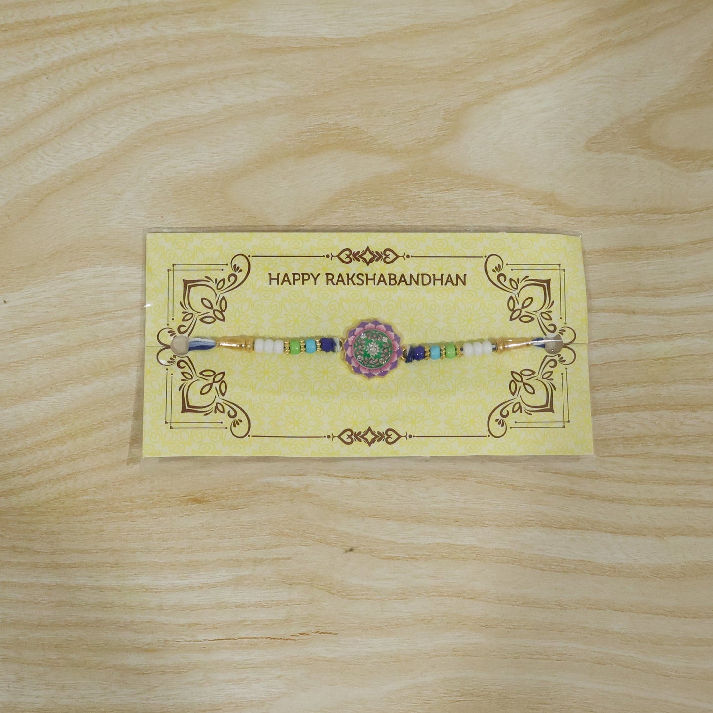 Decorative floral Rakhi with beads and floral stone for Rakshabandhan