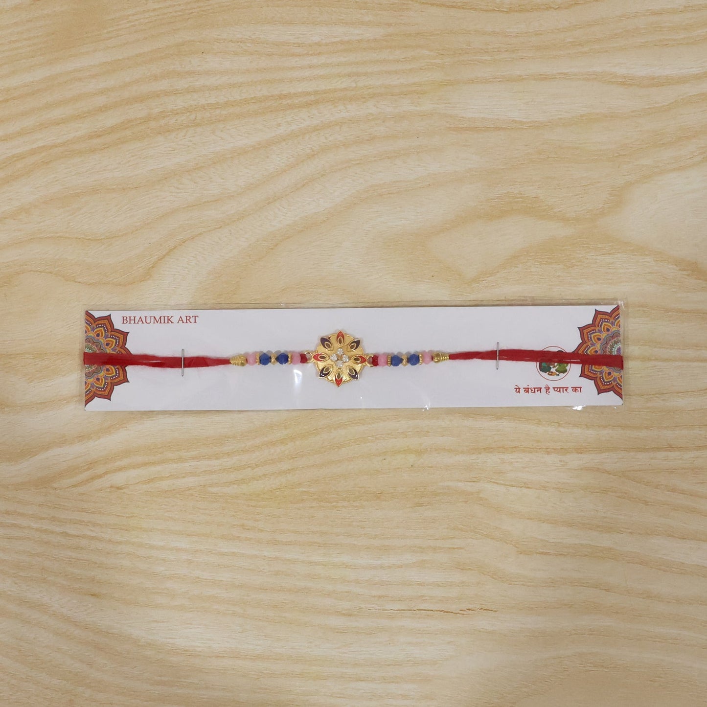 Elegant floral Rakhi with ornate beadwork
