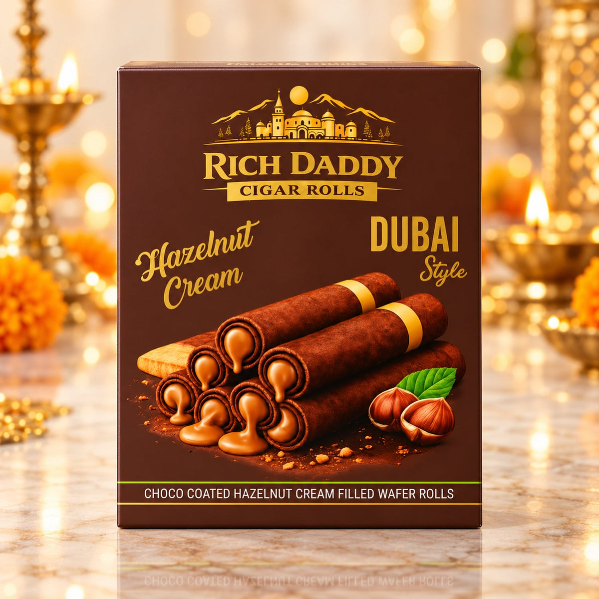 A brown box of Rich Daddy Hazelnut Cream Dubai Style Cigar Rolls, showing several chocolate-coated wafer rolls and hazelnuts.