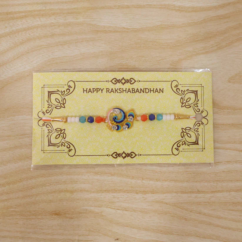 Elegant Rakhi with decorative beads, perfect for sibling gifting