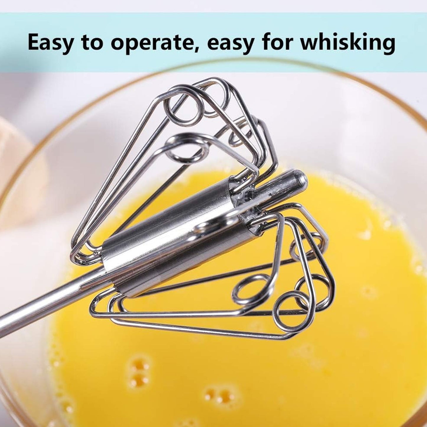 Ergonomic handle of the semi-automatic hand push whisk for comfortable grip.