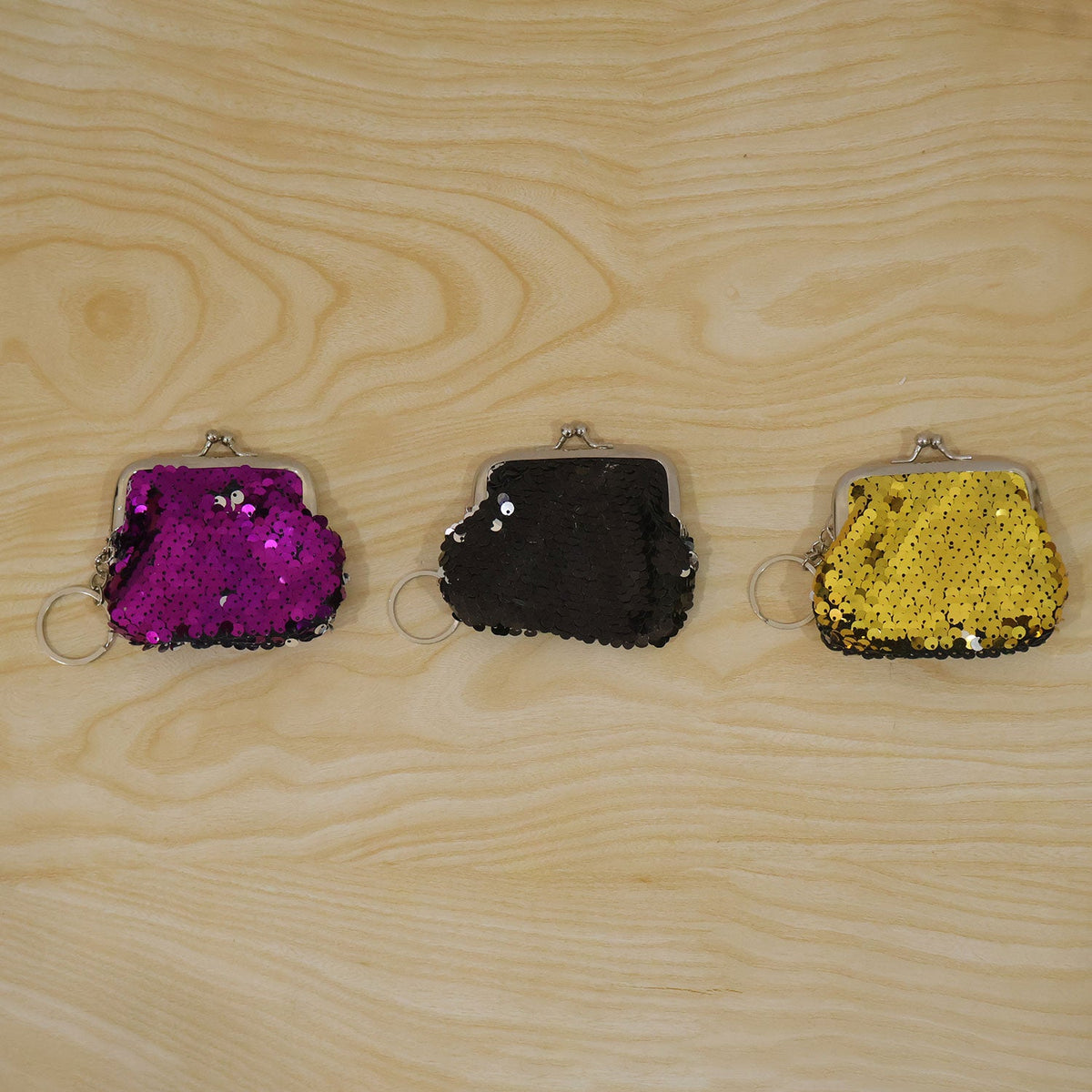 Sequined coin purse keychain showing the keyring attachment