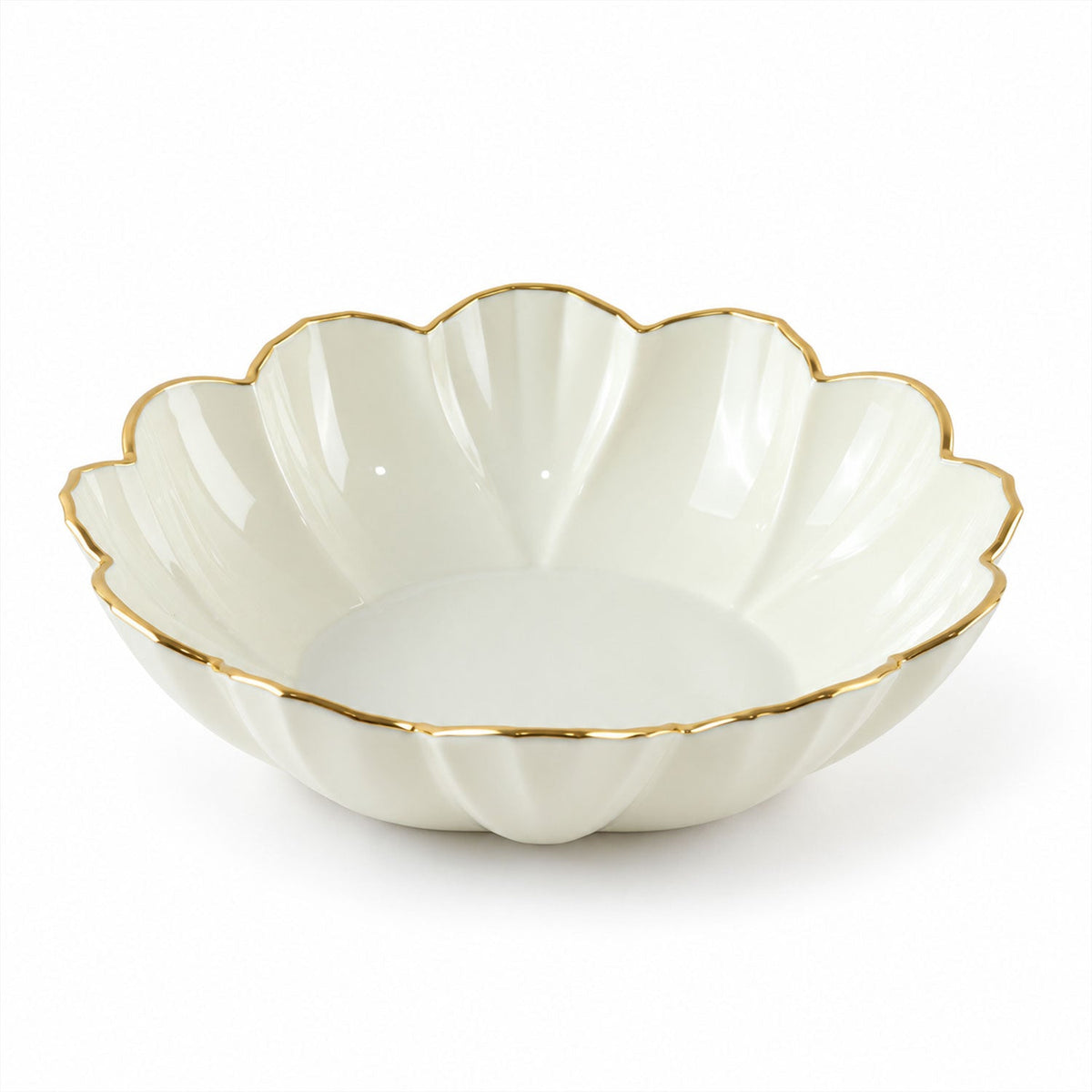Empty white ceramic scalloped bowl with a gold rim on a plain white background.