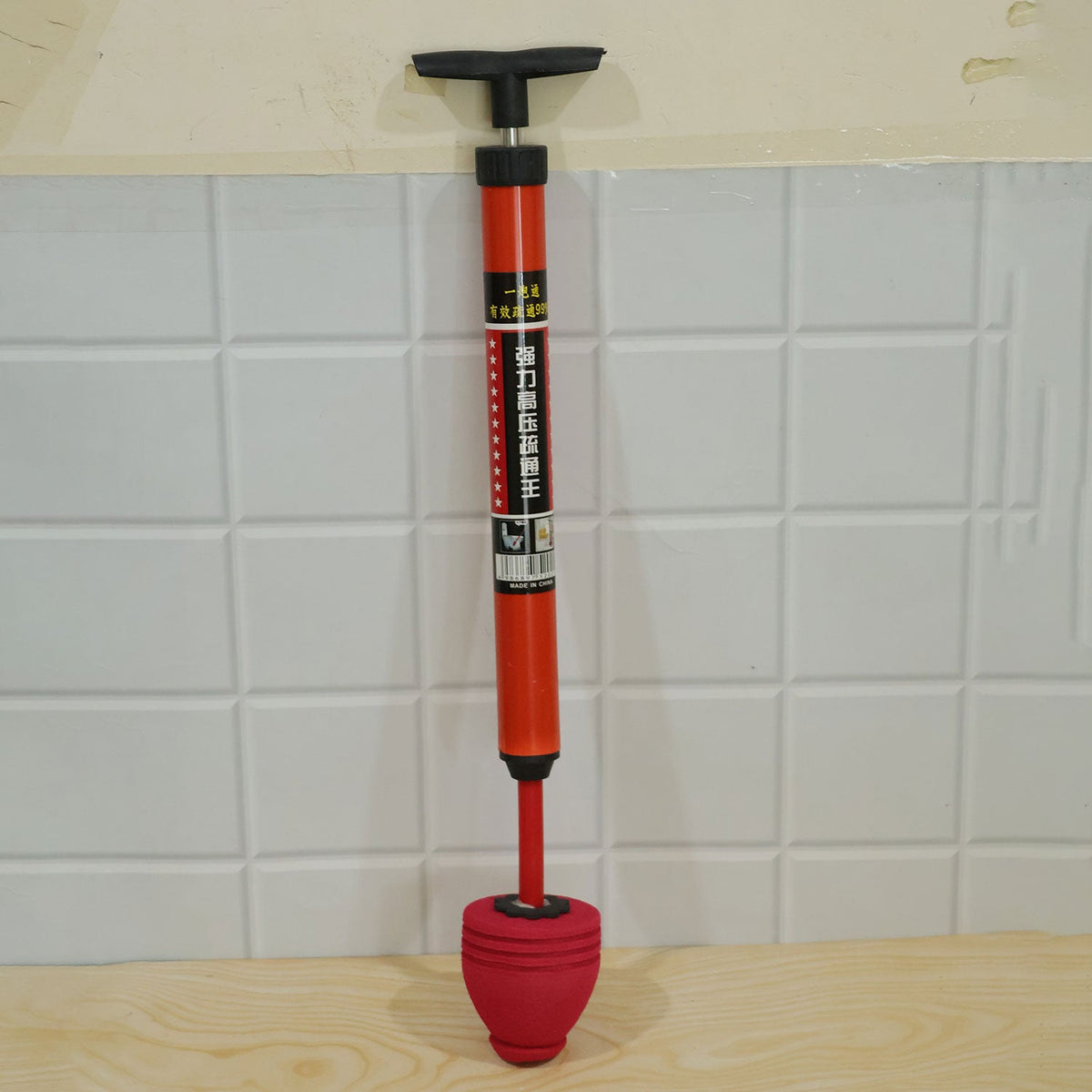 Drain plunger unclogging use