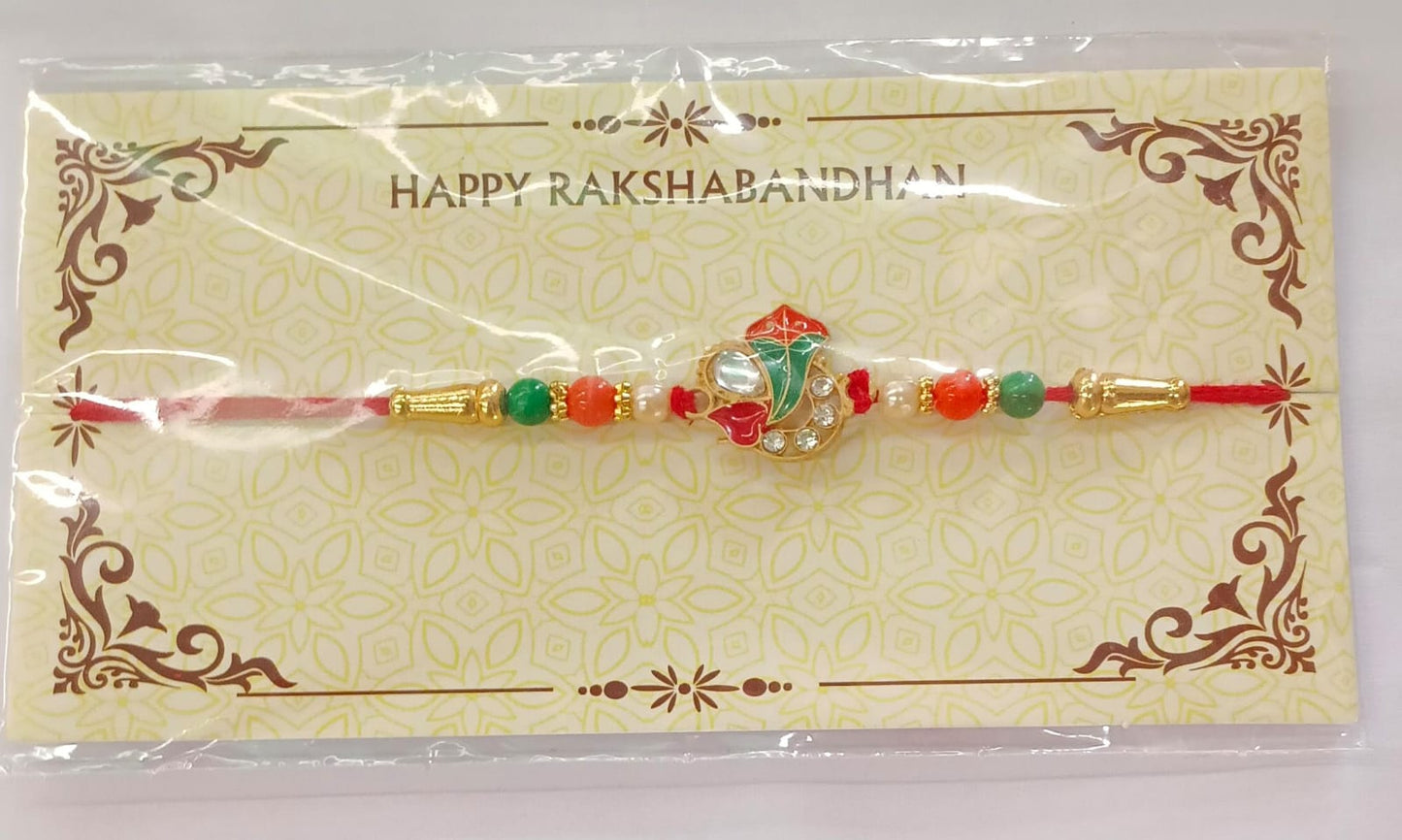 Full view of Ganpati Rakhi combining enamel Ganpati symbol with traditional festive bead work