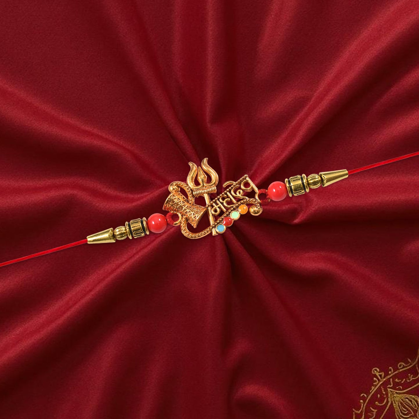 Elegant Shiv Rakhi with Trishul and Damru motifs perfect for Raksha Bandhan