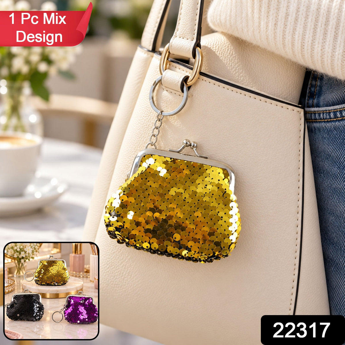 A gold sequined coin purse with a silver kiss-lock clasp and key ring hangs from a cream-colored handbag. – view 2