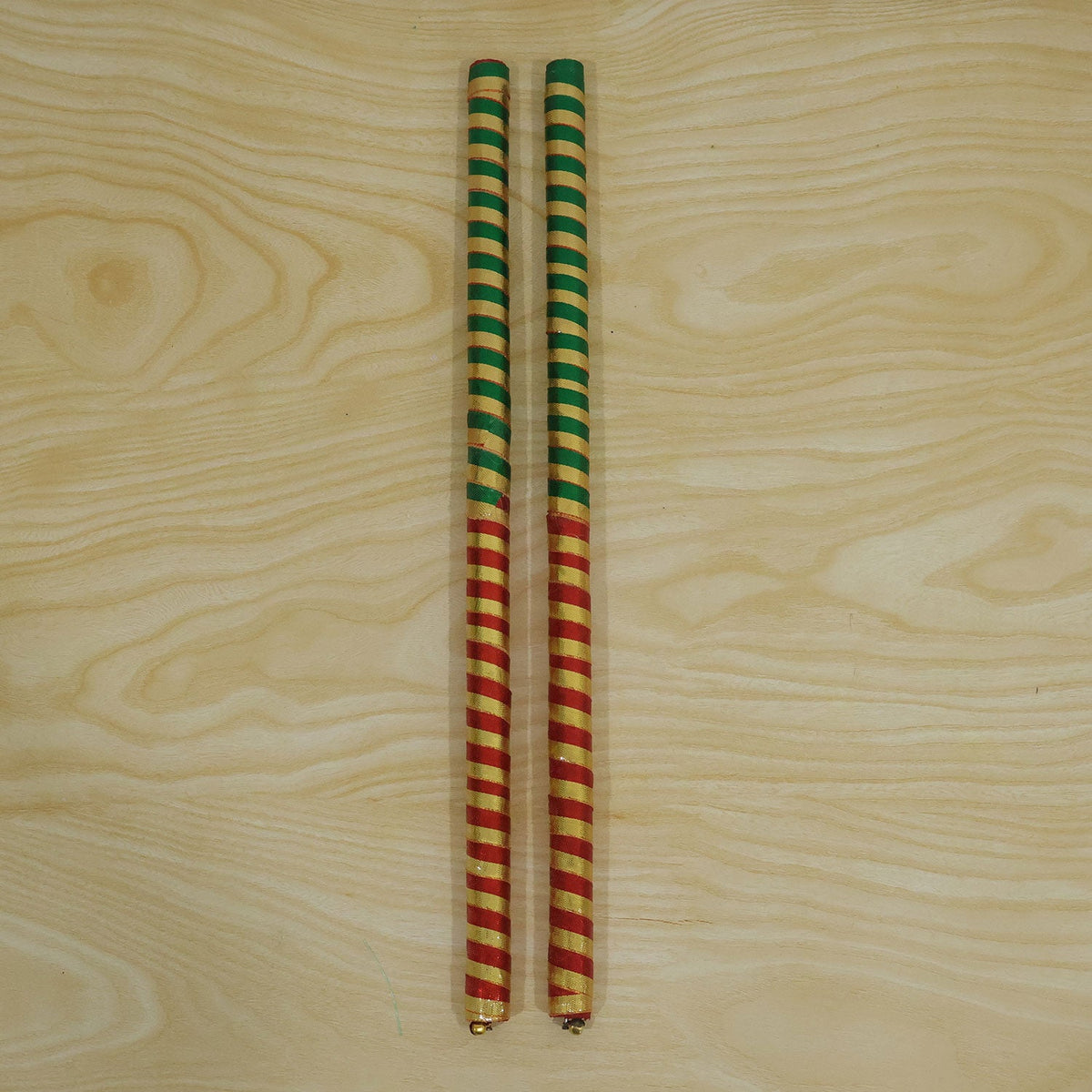 Live photo of wooden Dandiya stick 2 Pc set in plastic packing
