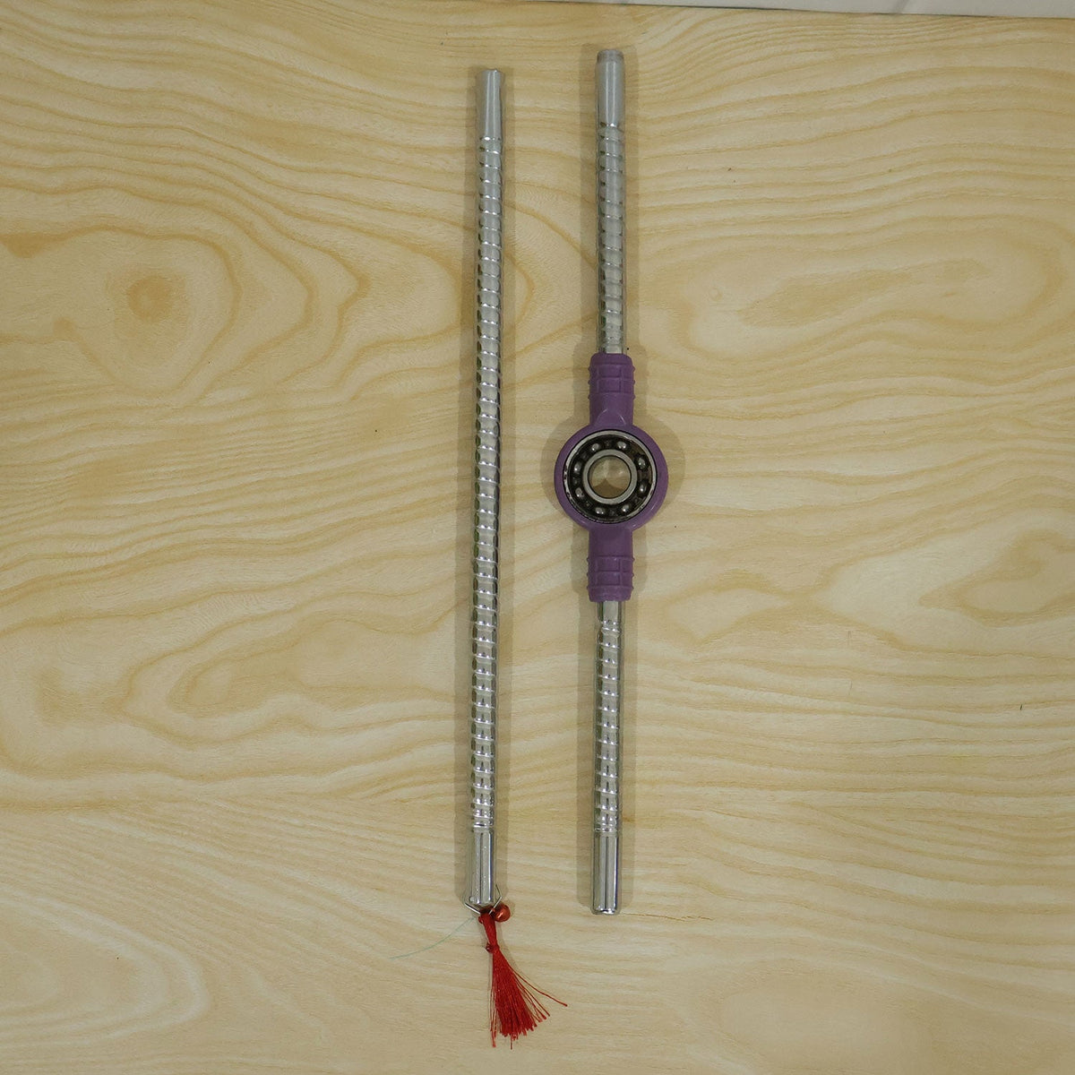 Live photo of steel base Dandiya stick pair