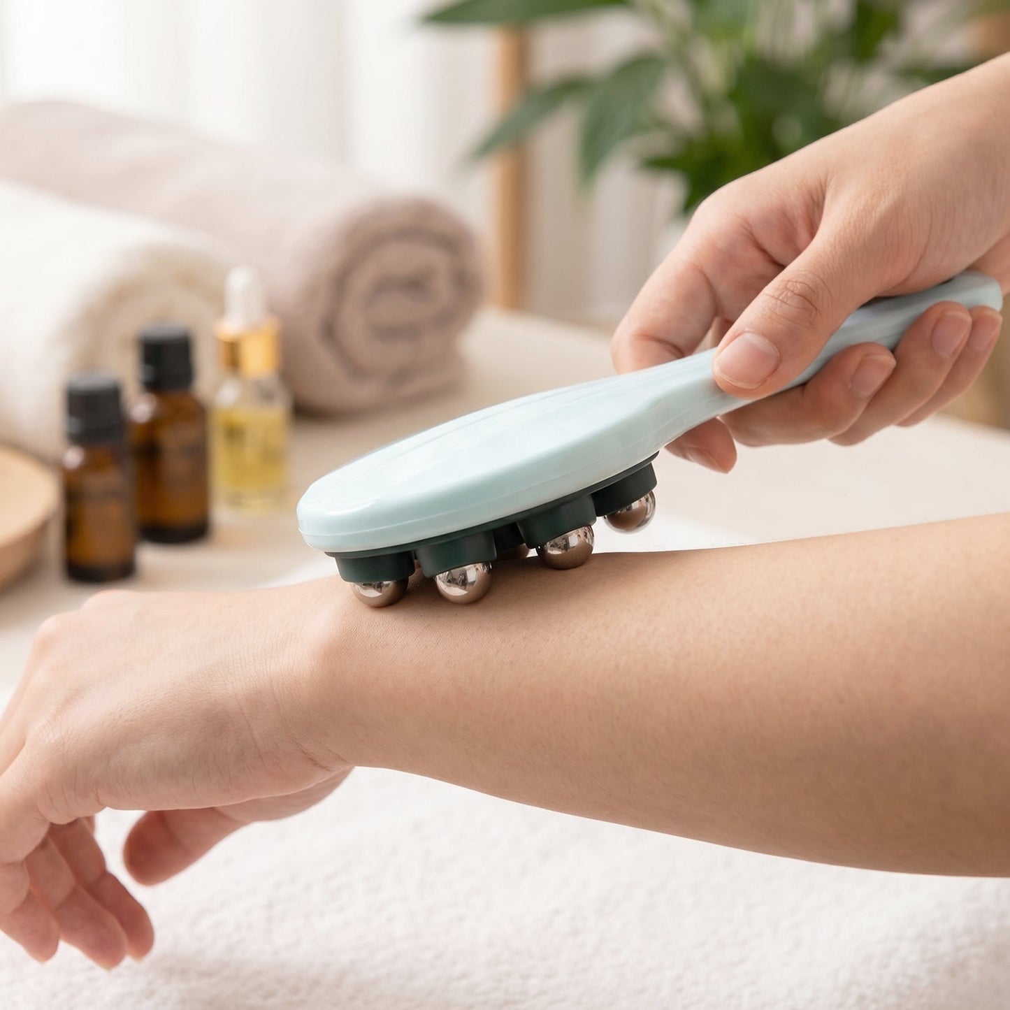 Woman using the handheld body massager on her leg for soothing relief.