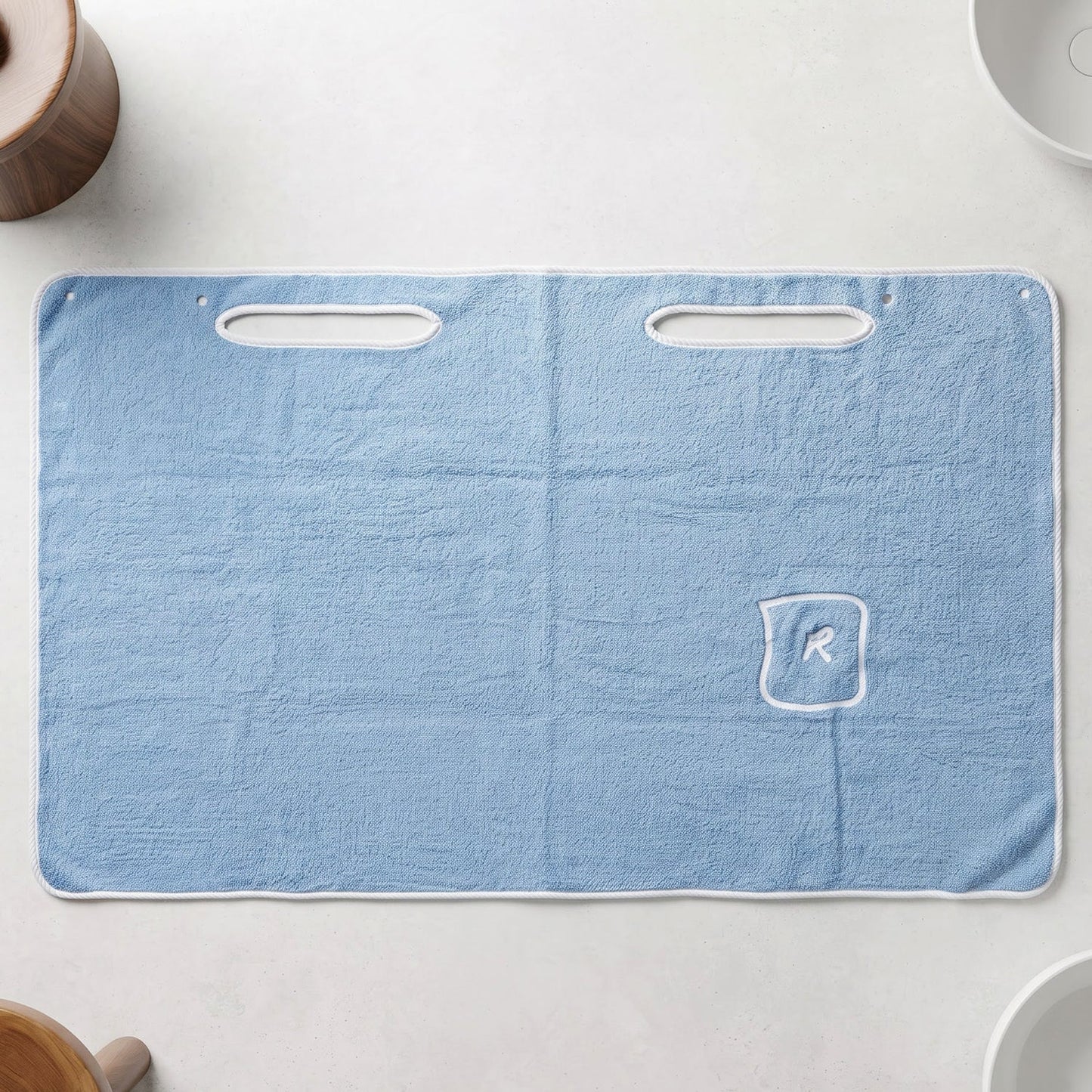 Absorbent towel with hand openings