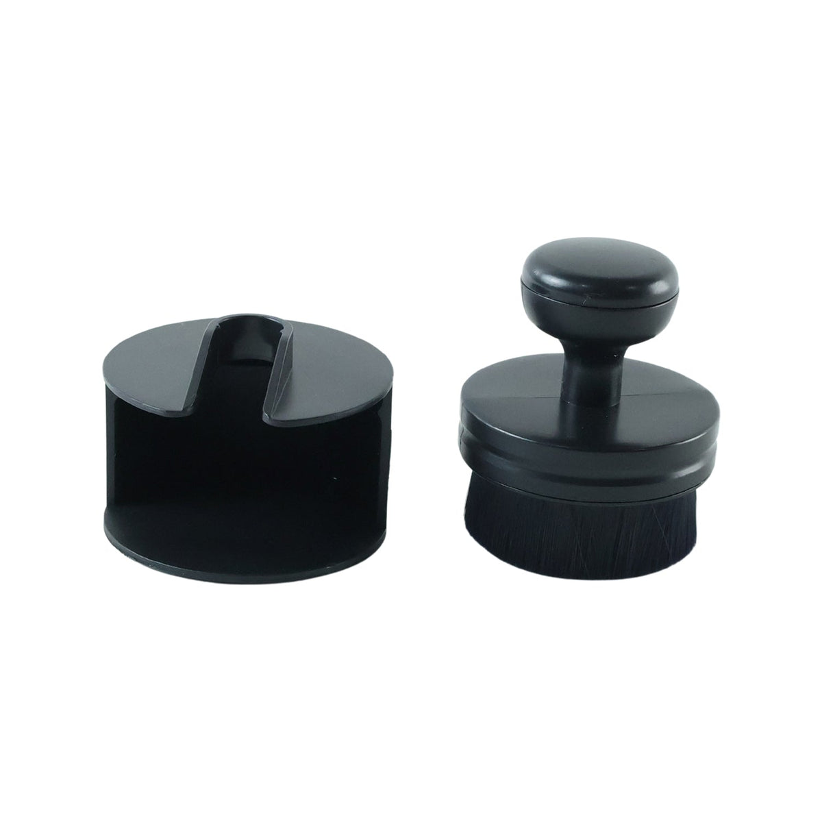 The black detailing brush and its cylindrical base are displayed side-by-side on a plain white background.
