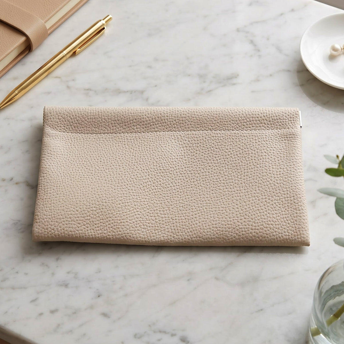Women slim wallet on light background