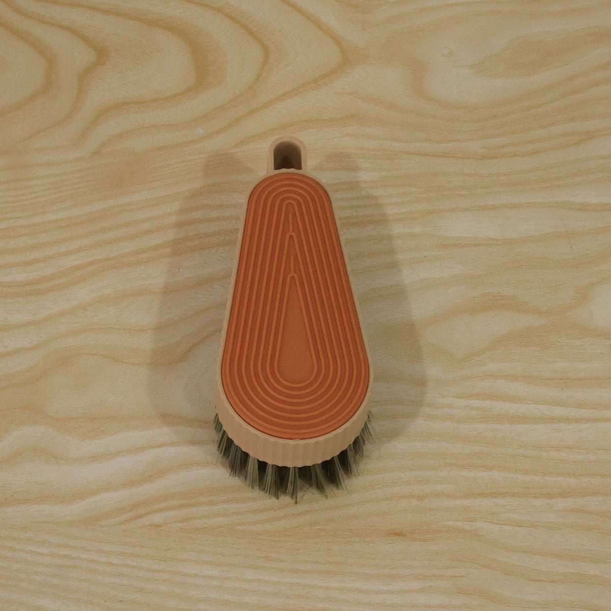 Multipurpose cleaning brush with textured grip and dense bristles 06