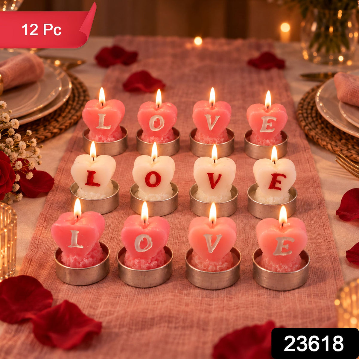 A dozen heart-shaped tealight candles, some pink with white letters, some white with red letters, on a table with petals.