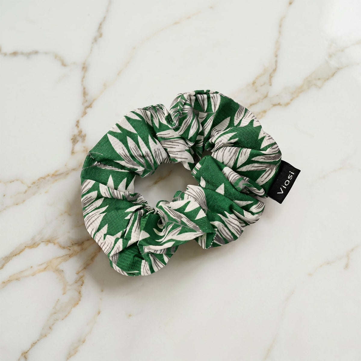 Close-up of soft fabric hair band preventing snagging and creases