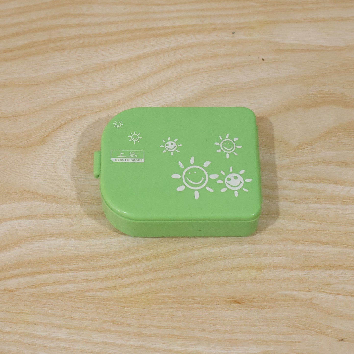 Pill organizer box shown with dimensions for size reference.