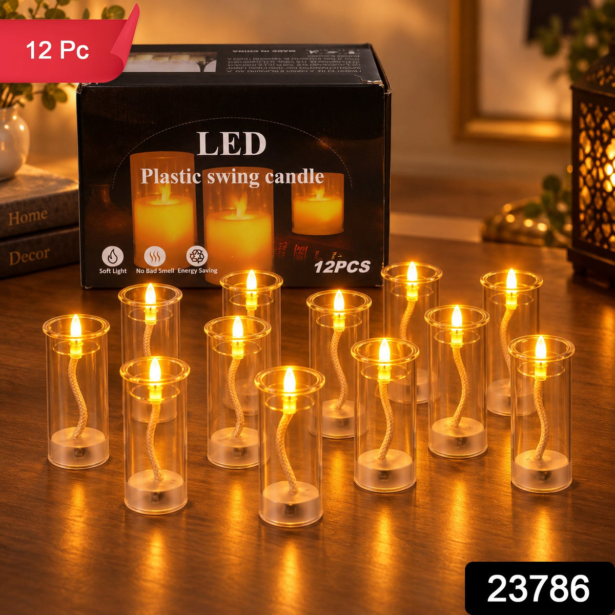 A dozen illuminated LED swing candles in clear plastic tubes, with a product box and a red "12 Pc" label in the top left
