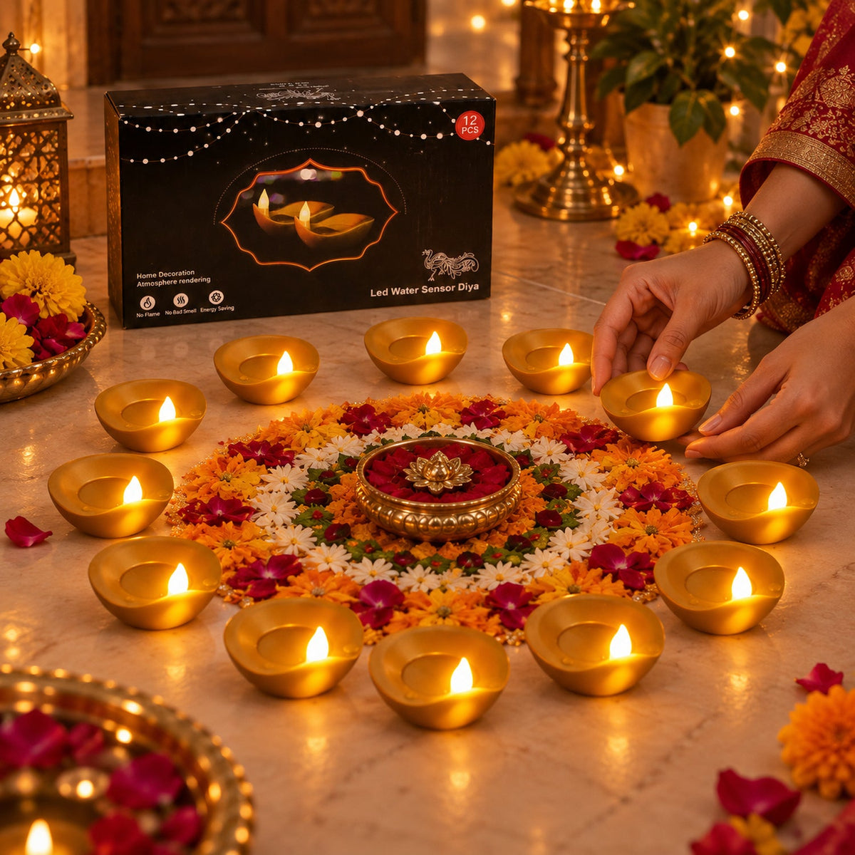 A person's hands arrange a glowing golden diya on a floor decorated with a vibrant floral pattern.
