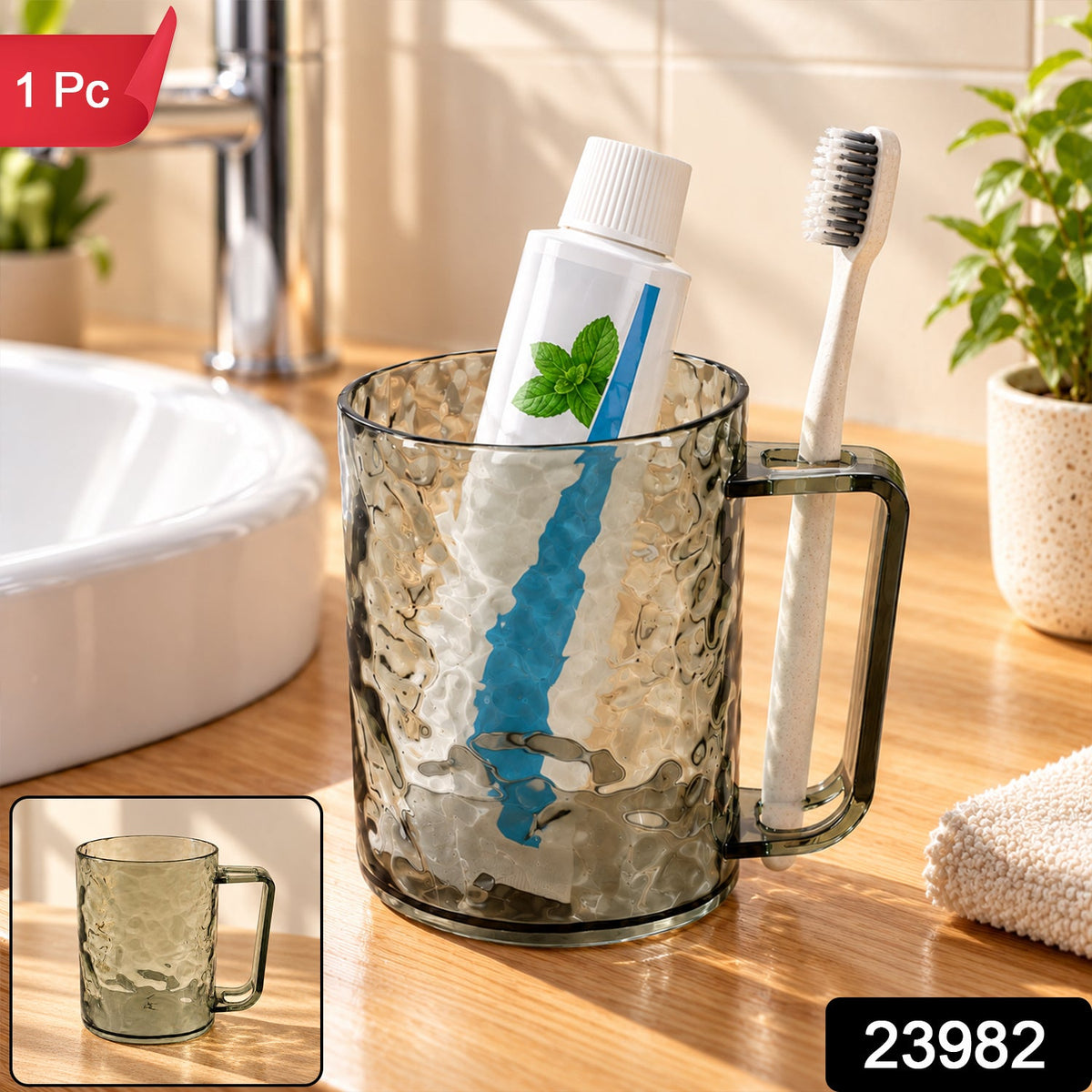 Dark grey textured plastic mug with toothpaste and toothbrush, a small inset image shows the mug alone.