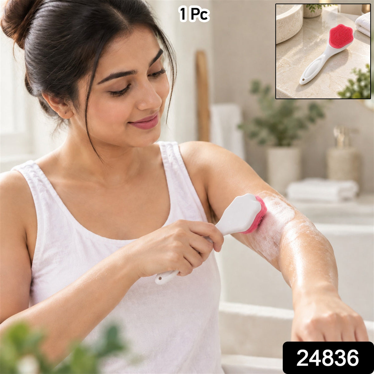 A woman in a white tank top scrubs her arm with a pink and white silicone brush; an inset shows the brush alone.