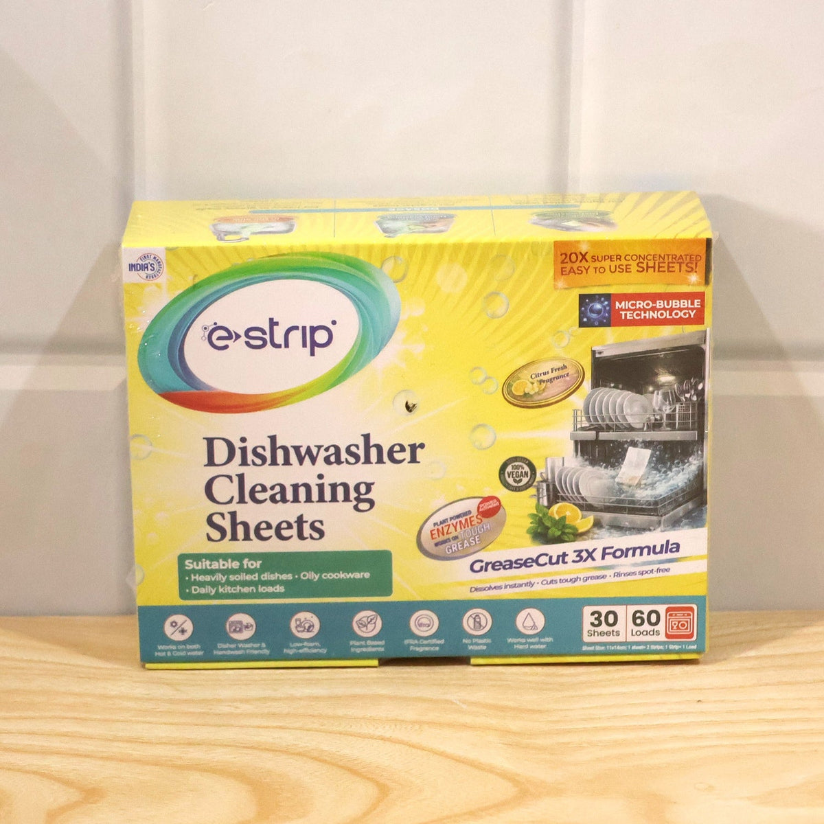 Dishwashing cleaning sheets in a kitchen setting with utensils