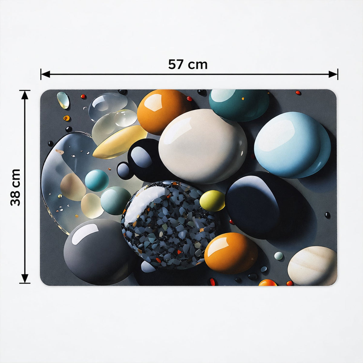 A rectangular mat with a pebble design, showing dimensions of 57 cm by 38 cm.