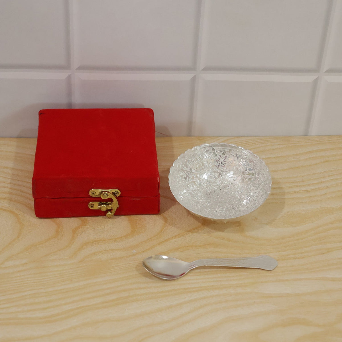 Silver finish floral serving bowl in use with snacks