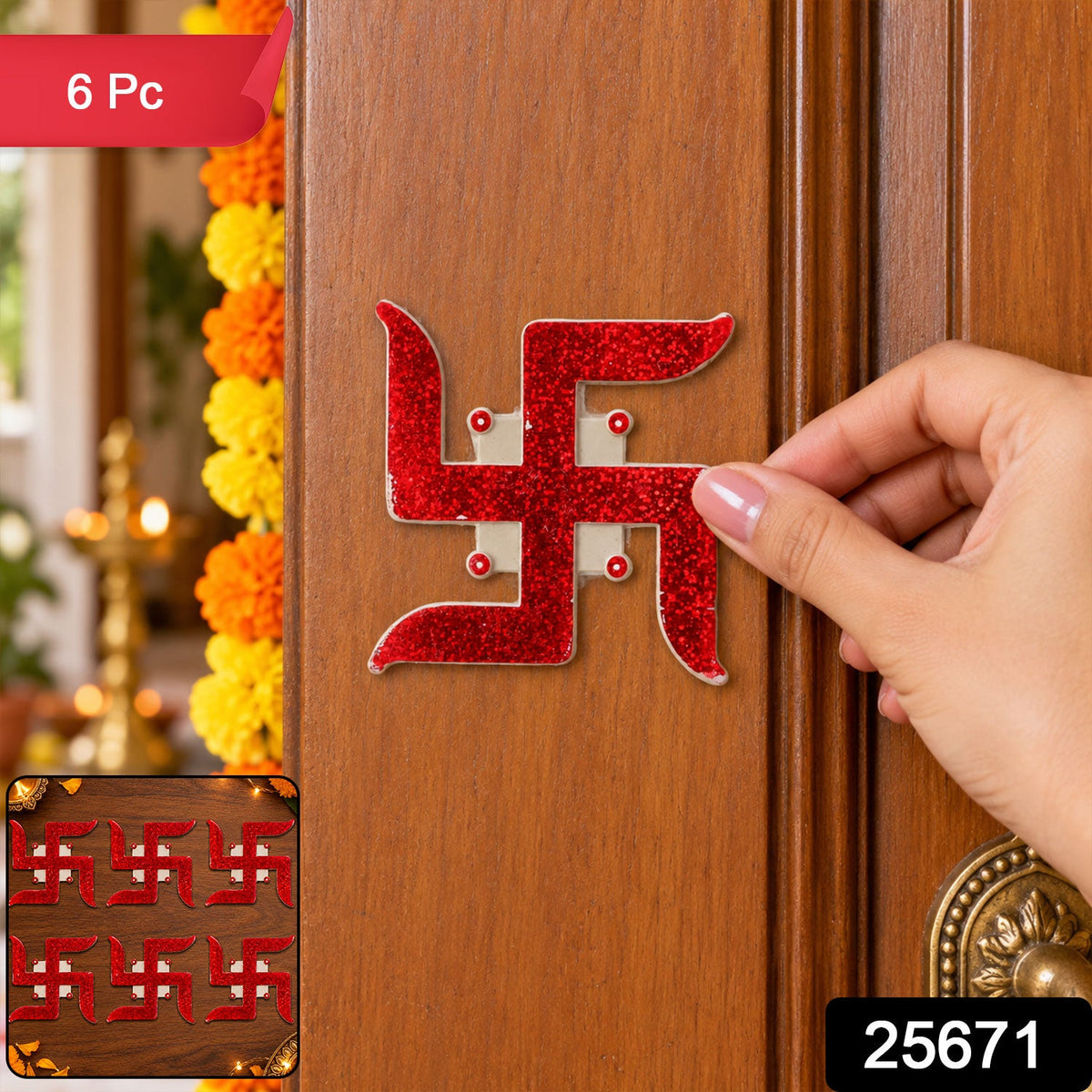 A hand applies a red glitter swastik sticker to a brown wooden door, with a marigold garland visible on the left.