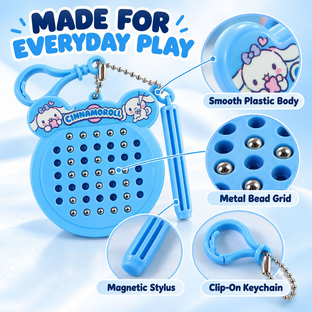 A blue Cinnamoroll magnetic drawing pad keychain with a stylus, showcasing its smooth plastic body and metal bead grid.